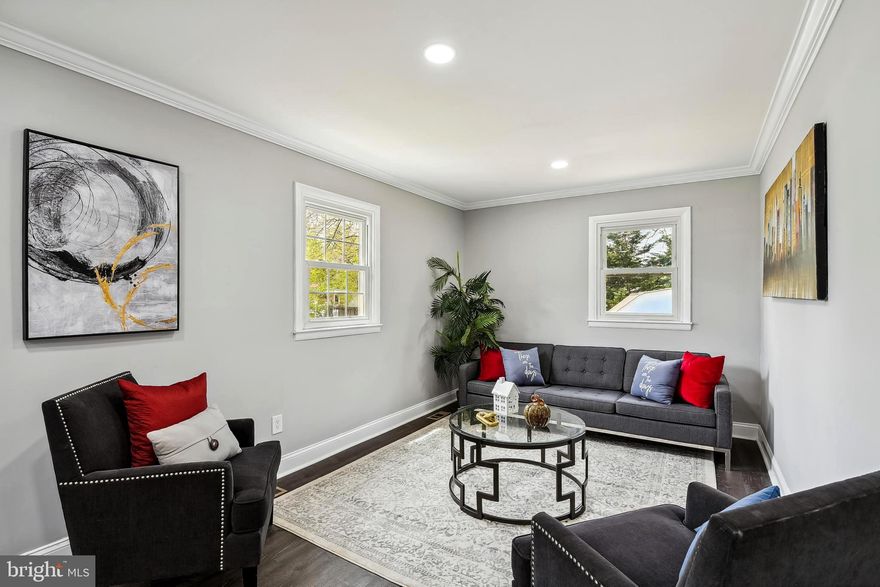 Wow   Under 400k!!!!Welcome Home!Fully renovated from top to bottom Level!!!!This home Has Beautiful   hardwoods throughout. Fully gourmet renovated kitchen  with SS Appliances , Brand new 42” cabinets, and Gorgeous quartz countertops with Amazing backsplash!! This home has a large main level Master bedroom with a bathroom right outside the bedroom area, 2 additional bedrooms on the upper floor ,each w/lots of closet space and  They share an additional full Renovated bathroom. The finished basement has 
1-bedrooms/office// exercise room , laundry room, and a Open living space. All  bathrooms have been  renovated. All   floors been updated, new carpet, freshly painted, updated major systems and the list goes on, and on. Property has a ramp for access. The yard is very large with lots of space and a planting area, shed and fenced backyard! This property is closely located to major routes, BWI -Airport, restaurants, and lots of entertainment around the area. It is a must see!!!