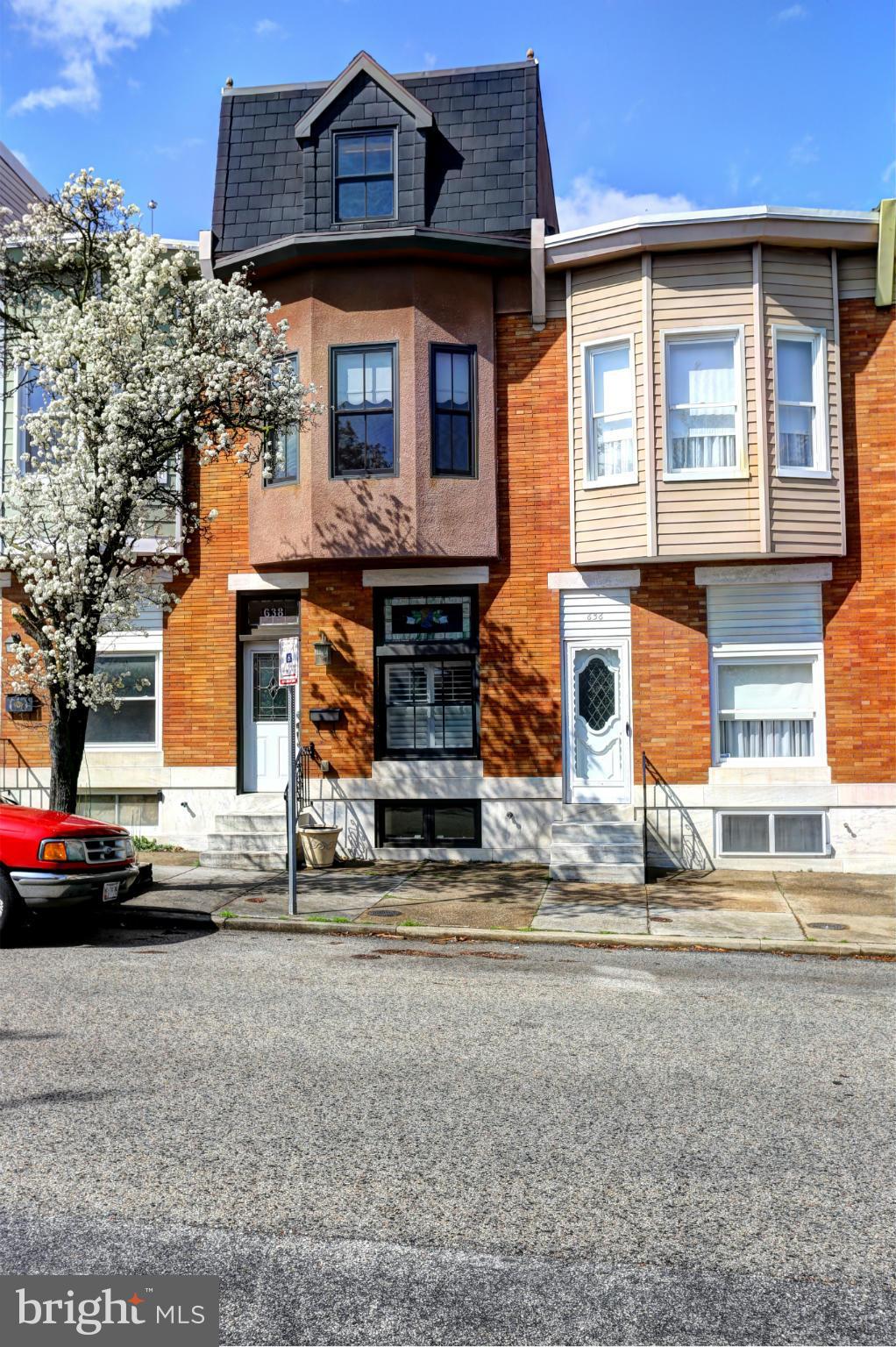 Welcome Home! Canton Living at its Finest. Updated Throughout, 3-4 bedrooms, 2 Full and 2 Half Bath. Parking Pad. 4 Finished levels with upper level loft. 3 Tiered Rooftop Deck with unobstructed city skyline and water views. Great Price!