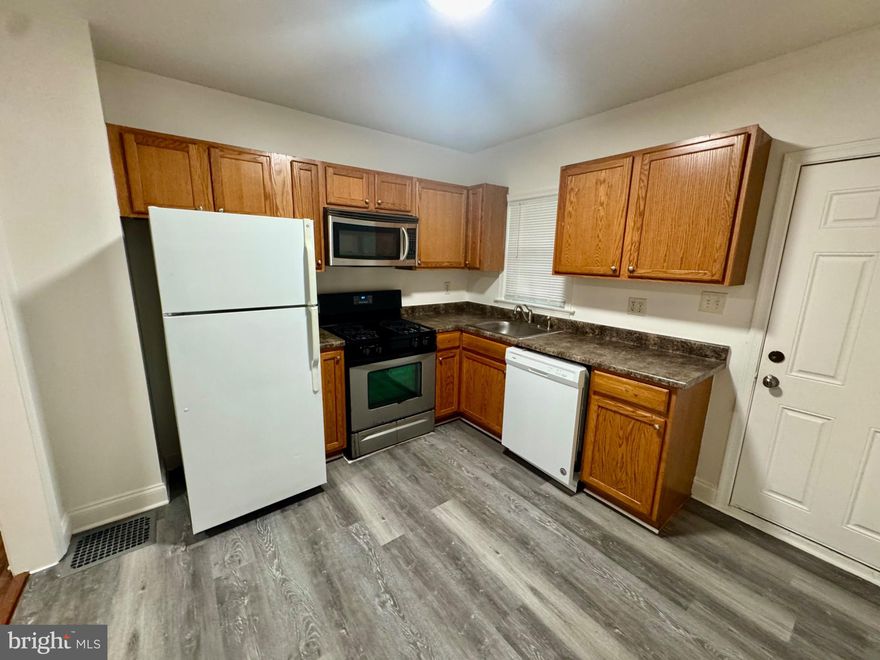 This charming Colonial-style townhouse offers a blend of comfort and convenience in a vibrant community. The interior is designed for efficient living. The kitchen is equipped with essential appliances, including a dishwasher, dryer, microwave, and wall oven, ensuring a seamless cooking experience. Located in a neighborhood known for its accessibility to local amenities, residents enjoy proximity to parks, recreational facilities, and public services. The area boasts reputable schools, making it an ideal choice for those seeking quality education options. The unfinished basement provides additional storage or potential for customization, while on-street parking enhances convenience. This property represents an excellent opportunity to embrace a lifestyle enriched by community engagement and local resources. Experience the benefits of living in a well-connected neighborhood that prioritizes both comfort and accessibility.