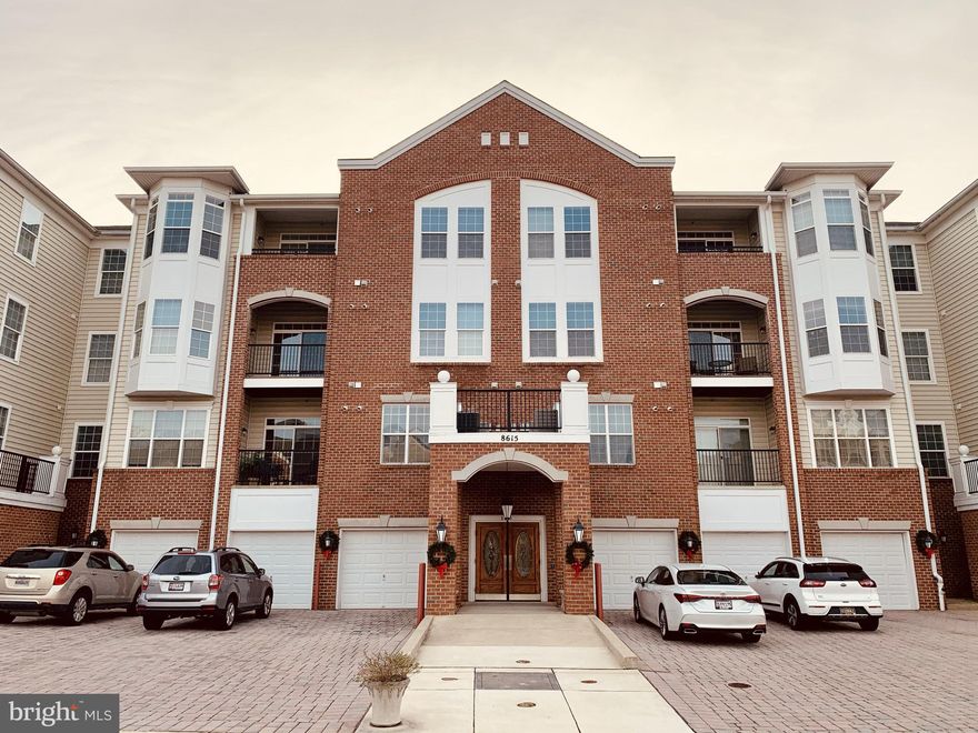 Welcome to Piney Orchard, in Cedar Ridge, a 55+ Community. Rarely available Top Floor Unit with Den and front-facing Balcony! All within a secure building. Hardwood Flooring, Crown Molding, and a Tray Ceiling give depth in the main living area. Tile floors grace the Kitchen and Bathrooms. Carpeting in Bedrooms. Lavish community amenities abound - bocce, tennis, fitness center, a selection of 4 indoor and outdoor pools, community club room, walking trails, and tot lots, all for your enjoyment! Easy access to shopping, restaurants, and local ice rink. Full-sized in-unit Laundry, Private single car detached Garage, and additional designated Parking Spot, all included.