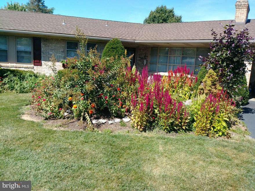 Great opportunity to own this one of a kind, all brick raised ranch that includes a  6 car garage plus work room and more than 3,600 sq ft of finished living area. This well constructed home features 4 bedrooms, 3 full baths, family room with fire place, extra rooms that could be used  for an office, home gym, man cave, etc. and a fully exposed finished lower level.  There are several outside patios, some covered and private,  as well as a screened in patio and a four seasons sun room. Enjoy your own matured raspberries, strawberries and apples with additional garden space if needed. The lot is  fully fenced for privacy with an additional building lot(separate deed) for a future home or additional privacy.