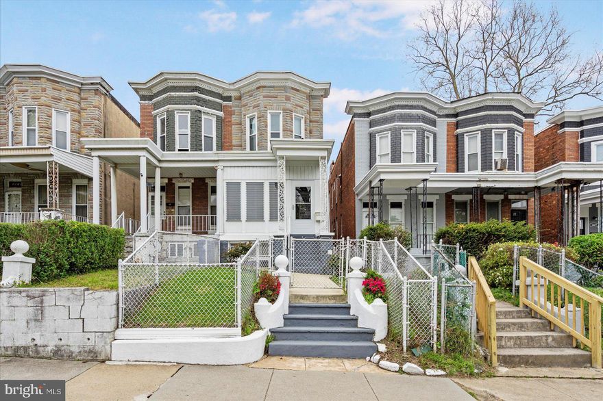 Welcome to 3023 Belmont Ave – a charming two-story semi-detached townhouse located in the Rosemont neighborhood of Baltimore City. This well-maintained 3-bedroom, 1-bath home offers spacious bedrooms, a formal dining room, and original wood floors full of character. Cozy up by the electric fireplace or enjoy extra space in the finished basement—great for rec area and storage.

Step outside to a screened-in front porch, perfect for relaxing, and a second porch off the third bedroom. The kitchen includes a pantry space with potential to convert into a powder room.  Also an enclosed area in the rear of the kitchen that leads to the yard and garage.  Additional updates include an alarm system for added peace of mind, nearly new furnace and water heater, windows installed in 2007, and roof recoated in 2022.

While there’s no central air, ceiling fans and window A/C units provide comfort year-round. Full of original charm and waiting for your personal touch, this home is a solid opportunity for homeowners or investors alike!