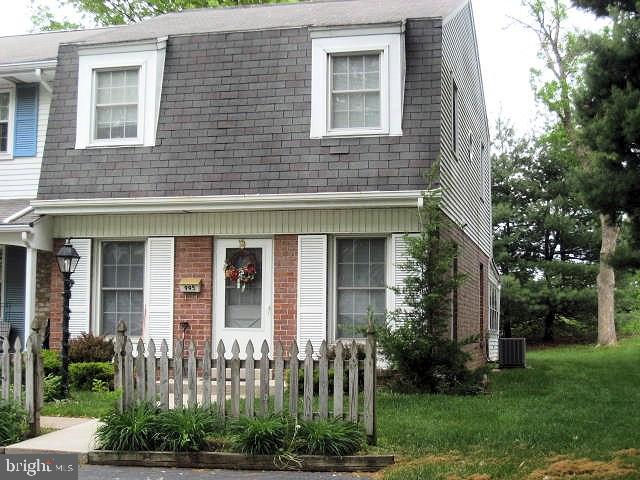 Discover the joys of owning a home in this end unit townhouse with big yard for extra privacy, a florida room and a full basement, partially finished. Freshly painted just for you, new kitchen and lighting. Enjoy economic gas heat & central air. Lots of off-street parking at your front door in a friendly neighborhood. Low association fees includes snow removal and lawn care and makes this home very affordable too!