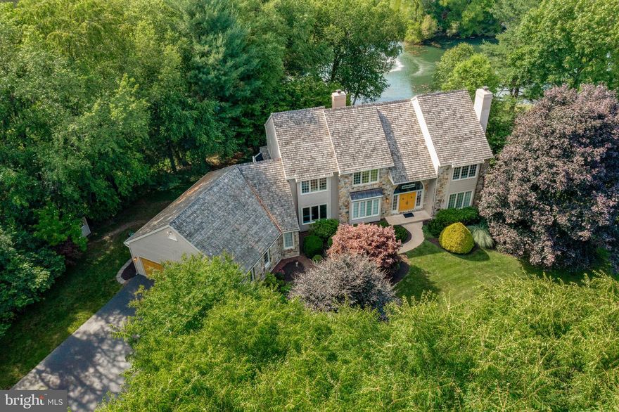 Welcome to 1220 Fieldstone Dr., West Chester, PA in the community of Deer Pointe. This impeccably maintained home is ideally situated at the end of a tranquil cul-de-sac on a sprawling 1.9-acre lot with serene pond views. It is within the prestigious West Chester School District, including Rustin High School. Step into the grandeur of this residence through a 2-story center entrance foyer adorned with a turned oak staircase. The formal living room boasts hardwood floors, double crown molding, and a cozy wood-burning fireplace. Through elegant glass French doors with a transom top, discover a professional office offering picturesque pond views. Enjoy intimate dinners in the formal dining room featuring hardwood floors, double crown molding, and chair rail details. Barn doors separate the dining room from the impressive 2-story family room, highlighted by a floor-to-ceiling stone gas fireplace flanked by twin French doors with feature glass above. The spacious kitchen is a chef's delight with a center island, pendant lighting, stainless steel appliances, and granite countertops. Adjacent is a separate breakfast area that opens onto a delightful, large screened porch, perfect for enjoying morning coffee or evening relaxation. Off the kitchen, you'll find a spacious mud room/laundry room complete with cabinets and a laundry sink, offering convenience and organization. There are formal and informal powder rooms for guests' comfort and convenience. Ascend to the second floor where the expansive master suite awaits, featuring a tray ceiling, a generous walk-in closet, and a luxurious master bathroom. The master bath is appointed with double bowl waterfall vanities, a soaking tub, and a tiled shower. Step out onto the balcony from the master suite and take in the serene backyard and pond views. Additional bedrooms on the second floor are all generously sized and share a tiled hall bathroom equipped with a double bowl vanity and tub/shower combination. The huge, walk-out basement presents an opportunity for future expansion or serves as excellent storage space, boasting 9-foot ceilings, a glass door, and a double window for natural light. The attached garage comfortably accommodates 4 cars along with ample space for lawn equipment. Outside, a two-tier deck overlooks the tranquil pond with fountain feature, providing a perfect setting for outdoor gatherings and relaxation. This home provides everything you desire, ideally located just minutes from West Chester Borough, schools, shopping, and all major routes.
