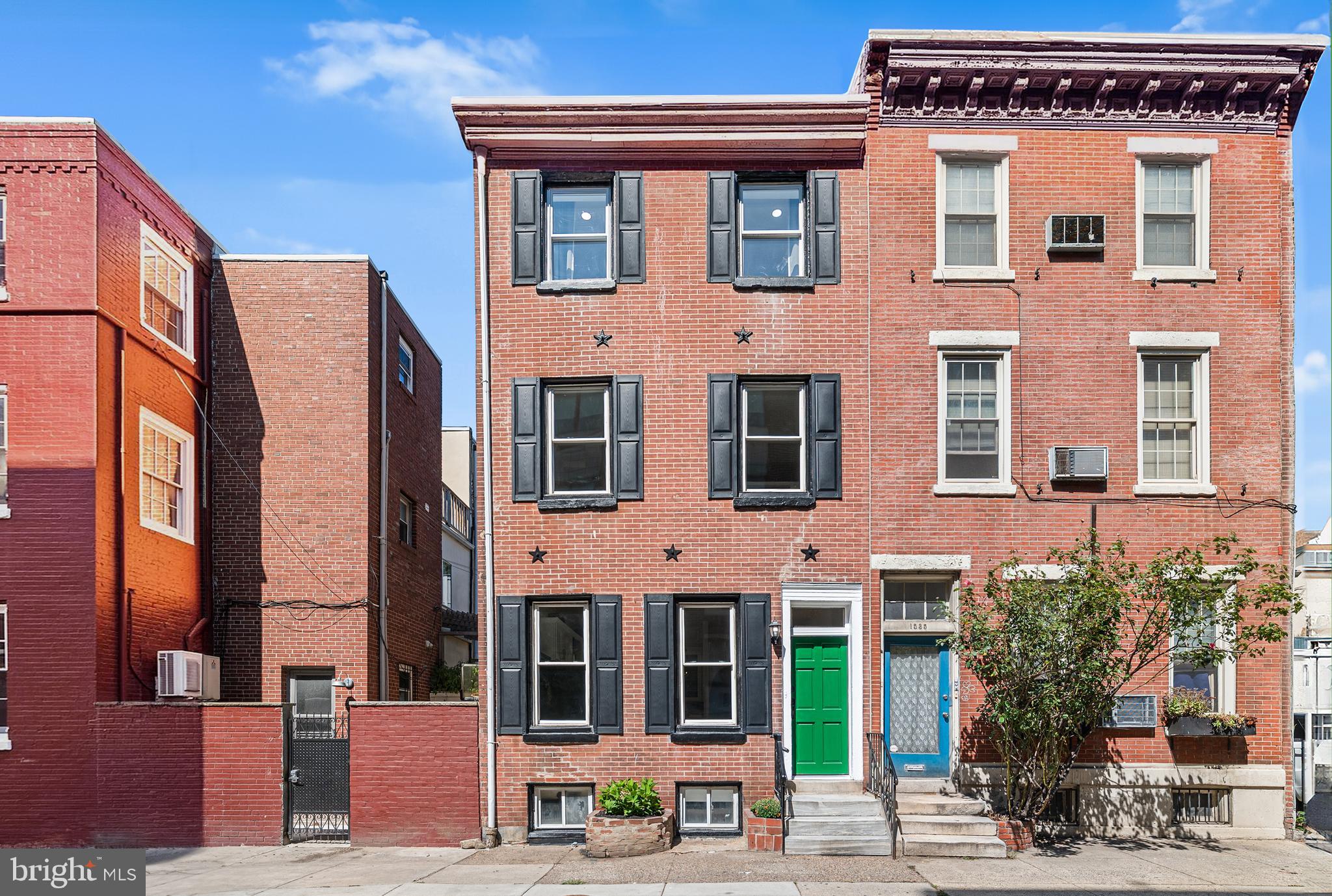Located in the highly sought-after Greenfield School catchment, this beautifully restored historic townhouse in Rittenhouse offers the perfect blend of charm and modern luxury—with a 10-year tax abatement pending! Enter into the main level and experience soaring extra-high ceilings that enhance the spacious, open-concept layout. The stunning kitchen has been fully reimagined with brand new appliances, including a sleek under-counter microwave and a sparkling modern range hood, plus convenient pull-out trash cans tucked under the counter. Just off the kitchen and dining area through an archway is access to the private patio, complete with a large storage shed and a built-in garden bed—perfect for urban gardening or weekend relaxation. Upstairs, the second level offers a spacious bedroom featuring a large double-door closet with extra storage space above. The full hall bathroom includes a tub/shower combo and a corner shelving area for stylish and functional storage. The third floor is dedicated to a tranquil primary suite, boasting a tasteful accent wall, another large double-door closet, and a spa-inspired ensuite bathroom with a luxurious walk-in waterfall shower. The stairwell connecting the main level to the third floor features stunning handcrafted mosaic tile artwork, a preserved piece of the home’s original character. The fully finished basement adds valuable living space and versatility. It includes a modern accent wall with an electric fireplace, a convenient corner coat closet, custom floating shelves, a stylish half bathroom, and a separate utility room housing a brand-new washer and dryer. For year-round comfort and peace of mind, the home is equipped with an all-new smart HVAC system backed by a 10-year transferable warranty. This move-in-ready home is the perfect combination of modern updates and historic charm, with every detail carefully considered for today’s urban lifestyle. Mortgage savings may be available for buyers of this listing.