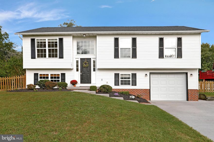 Well maintained 4 bedroom, 3 bathroom split foyer on a nice corner lot. 3 bedrooms, 2 full baths on the main level.  New carpet, new vinyl kitchen floor, and new paint. Fully finished lower level offers a huge rec room with gas fireplace, a den,  laundry room, additional bedroom and bathroom, and access to the garage. Rear deck has stairs down to the fenced in yard. Storage shed will convey. One car garage and concrete driveway offer plenty of parking.  AC & roof were both replaced in 2019.  This one will go fast!  Schedule your showing today!