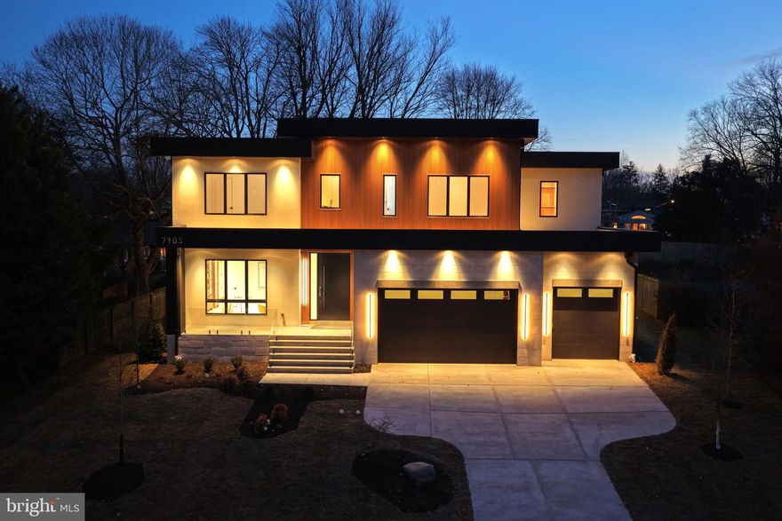 Hello, future homeowner. I’ve been waiting for you. My name? I don’t need one. But you’ll call me Home soon enough.

Crafted to stand apart and built with intention, I’m a contemporary statement of design and precision, spanning over 8,000 square feet across three thoughtfully curated levels—each connected by a future-ready elevator shaft, so every floor feels like the main event.

Your arrival sets the tone. A striking 10’ x 5’ aluminum pivot entry door with sidelights and an integrated camera opens to 11-foot ceilings, wide-plank engineered white oak floors, and expansive Pella casement windows. Architectural wall paneling, custom 8’ interior doors, pocket doors, and a floating staircase with glass railings and illuminated steps reinforce that nothing here was accidental. Lighting is equally intentional, featuring ASD trimless 4” recessed LEDs on the main and lower levels, paired with LUXRITE recessed and flush-mount LEDs in closets and select spaces throughout.

I offer 6 bedrooms, 6 full baths, and 3 half baths, designed for comfort and flexibility. A private main-level suite includes its own exterior entrance, backyard access, Porcelanosa tile finishes, and a spa-style bath with a Delta Velum Monitor 14 Series pressure-balanced shower system in Brilliance stainless—perfect for guests or multigenerational living.

Now to the heart of it all. My main gourmet kitchen is a showpiece, featuring custom European cabinetry with smoked glass accents, quartz countertops, a full-height backsplash, dual sinks, and a premium Miele appliance suite with PITT cooktop, Thermador refrigerator, built-in coffee maker, oven/microwave combo, multiple dishwashers, and pot filler. Fixtures include Signature Hardware faucets and pot filler. Just beyond, a secondary catering kitchen—equipped with GE Café appliances, a Kraus Oletto faucet, KIBI circular pot filler, and direct patio access—keeps entertaining seamless.

In my dramatic two-story family room, a porcelain tile fireplace anchors the space, while a Bonelli multi-sliding, multi-stacking 3XO glass door opens fully to the outdoors. Built-in audio throughout the home ensures every moment has the right soundtrack.

Upstairs, the primary suite rivals a luxury retreat, complete with a private balcony, porcelain tile fireplace, integrated speakers, and a morning wet bar. The spa-inspired bath features heated floors, dual vanities with makeup station, a freestanding soaking tub, and a thermostatic 15-spray ceiling-mounted shower system with handheld. The boutique dressing room impresses with a custom European closet system, glass doors, LED lighting, jewelry inserts, 42 drawers, a center island, and designer chandelier.

The lower level is where I truly unwind. With 10-foot ceilings, fully tiled recreation spaces, European cabinetry, a Kraus Oletto industrial faucet, Calacatta Zeus Black Cosmic Dekton countertops, XO tall refrigerator, wine display, media room, glass-enclosed gym, and custom cedar dry sauna, this level was built for nights in that feel like nights out. A bedroom, full bath, additional powder room, and walk-up side entrance complete the experience.

Behind the scenes, I deliver just as much: three-zone Carrier HVAC, gas and tankless water heaters, spray-foam insulation, dual sump pumps with radon mitigation, and a three-car garage with epoxy floors.

Outside, enjoy a flat, private backyard and covered rear patio finished in natural stone, with automatic retractable screens.

Tucked on a quiet cul-de-sac just moments from Downtown McLean and McLean High School, I offer the rare balance of privacy and proximity.

I’m not just a house.
I’m your next chapter—designed with intention, built with precision, and ready to welcome you home.