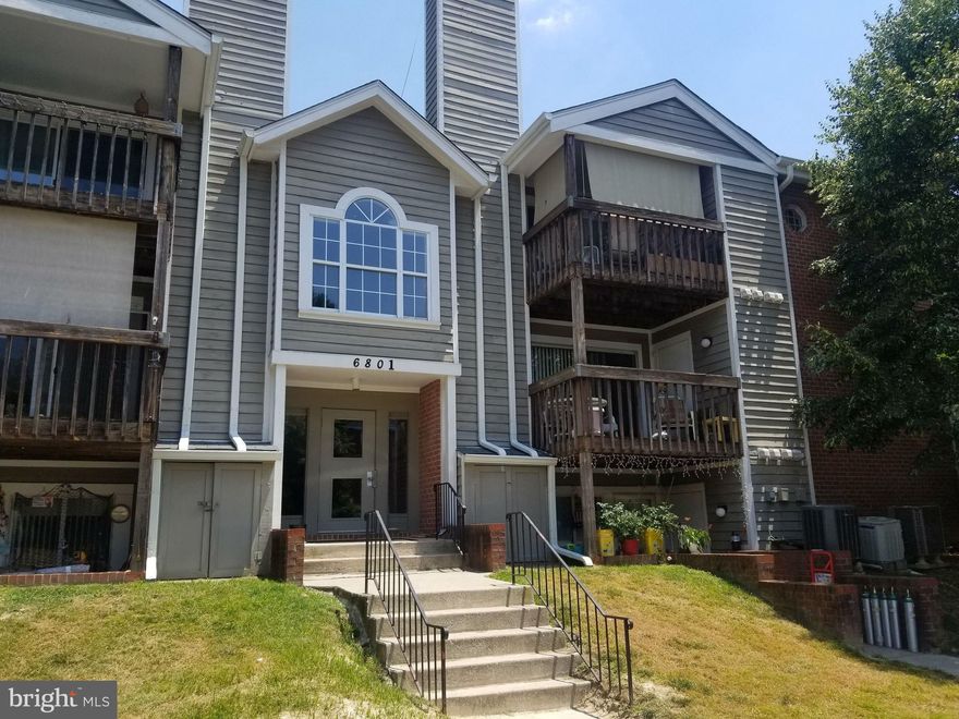 Great opportunity to own this condo unit. enjoy spacious room sizes, carpet floor, and fireplace in living room that opens to balcony. Conveniently located near shopping centers, restaurant and major commuter.