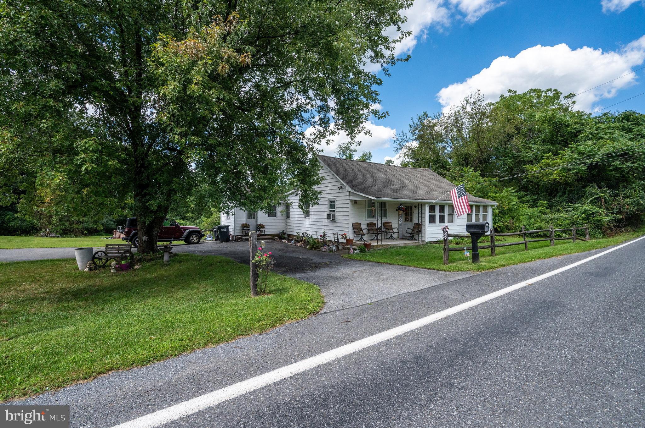 This charming 4-bedroom, 1-bathroom Ranch style home offers a perfect blend of country living and modern convenience! Situated on 1.25 acres in a peaceful rural setting, the home features an eat-in kitchen and laundry area, making daily living easy and functional. Step outside to a back deck overlooking your private pool and scenic pond, perfect for entertaining family and friends or enjoying quiet evenings outdoors. The property also includes a shed for extra storage and a U-shaped driveway for easy access and ample parking. Each bedroom provides ample space, creating a comfortable and inviting atmosphere throughout. New doors for the porch deck, front entry, and den are scheduled to be installed in October, adding a fresh update to the home. With plenty of room to spread out inside and out, this home is ideal for those seeking space, versatility, and the tranquility of country living.
*Accessory Structure*
At the rear of the property sits a separate cement block accessory structure featuring five rooms with electric and a toilet. The structure is in distressed condition and will require work, offering an excellent opportunity for a workshop, studio, storage, or creative project space. Its versatile layout provides additional functional space separate from the main home.
