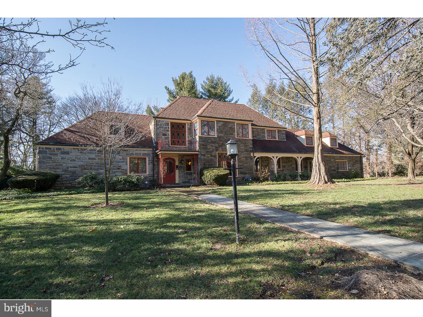 Welcome to 116 Raynham? unique stone colonial where old world charm combines with modern amenities is on the market for the very first time. This home is situated on almost an acre of picturesque landscaped grounds. Enter into a large inviting foyer with sweeping staircase that leads to an expansive living room with marble fireplace and dining room, both featuring french doors that open onto a large flagstone patio, perfect for entertaining. The first floor also includes a warm and inviting master suite with dressing area and newly renovated master bath. Abundant natural light throughout the home. A large eat-in kitchen with all new appliances, lots of cabinets and marble countertops leads to mudroom with W/D hook up and lots of additional storage. Adjacent to the kitchen is a library/den with built in cabinetry and separate entrance for private office. Upstairs features 4 bedrooms and 2 full bathrooms along with cedar closet, huge walk-in storage closet and convenient laundry shoot. Additional features include new hardwood floors throughout, beautiful crown molding, stain glass windows, low voltage recessed lighting and attached garage. The spacious finished basement provides another great entertaining space and is not to be missed. There you will find lots of natural light, stone fireplace, newly renovated powder room and ample storage area. Located on a quiet, desirable street in award winning Lower Merion School District close to train and public transportation. Be sure to check out this exceptional home!