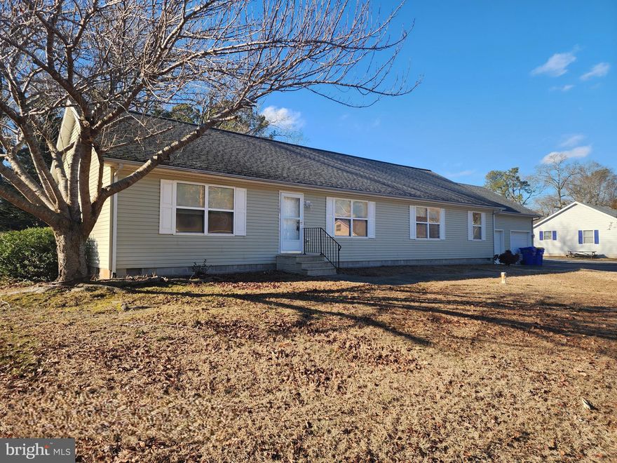 A rare find in this subdivision: Large 3BR, 2BA rancher with a 2-car garage situated on a manageable yard.  The development of "Sandy Beach" has access to the Indian River, offering kayak drops and a small boat ramp. Enjoy fishing, crabbing and jet skiing too!