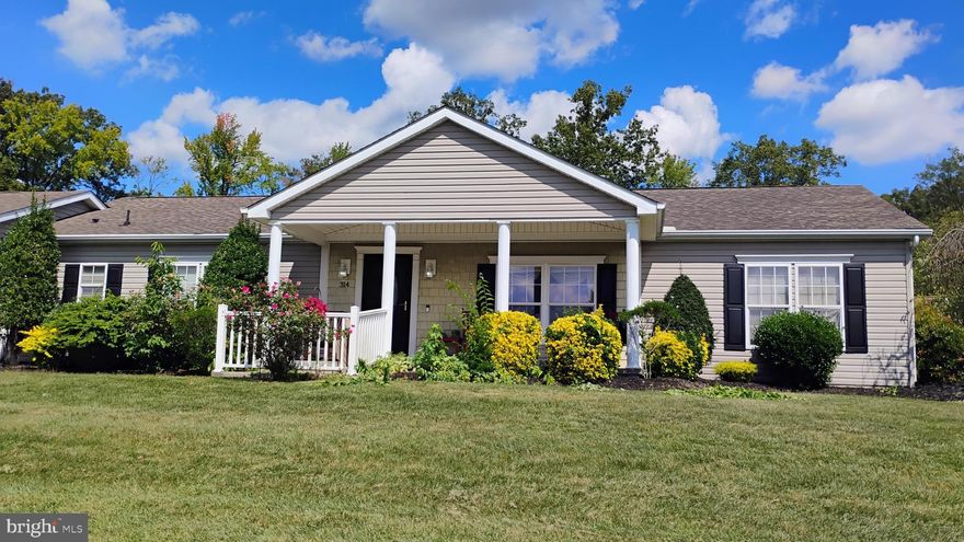 This is what you've been waiting for - A 2 Car Garage in Wild Meadows.  New ROOF November 2025!   Sits pretty on  a Corner Lot in Dover’s Wild Meadows 55+ Community!   Desirable Dover  open floor plan with hardwood- floors and an elegant formal dining room—ideal for entertaining or family gatherings. The spacious kitchen features  a center island, ample cabinetry, a pantry, and a sun-filled breakfast nook with backyard views.   The  primary suite has a walk in closet and full  bath . Two additional guest bedrooms offer privacy with their own full bath.   Beautiful landscaping and covered front porch and a large  private rear deck. The attached 2 car garage, ample driveway for company . $800/month land lease  lawn mowing  and  Community Amenities: Heated pool, hot tub, fitness center Clubhouse, library, bocce, horseshoes & more Full calendar of social events.  Prime Dover Location: Close to shopping, restaurants, hospitals, Route 1, and just a quick trip to Delaware beaches, Ocean City, and cities like Philly and D.C.  Buyer must be approved by Wild Meadows/RHP.