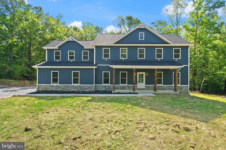 Price Improvement – Move-In Ready Custom Home!
Brand new and just completed, this beautifully finished custom home is ready for immediate occupancy. The open-concept main level features a chef’s kitchen with double wall ovens, cooktop, and large island, flowing into a spacious great room with gas fireplace. A private office and mudroom with half bath add functional space.
Upstairs offers four bedrooms, including a luxurious primary suite with dual sinks, walk-in shower, and large closet, plus a full bath and laundry room. Enjoy the charming stone-accented front porch, a 16x20 rear deck, 400 AMP service, and a full basement with rough-in for a future bath.
Ideally located near Warrenton, Fredericksburg, and Stafford—this is turn-key living at its best.  Open House Sunday 8/3 From 12-2PM.