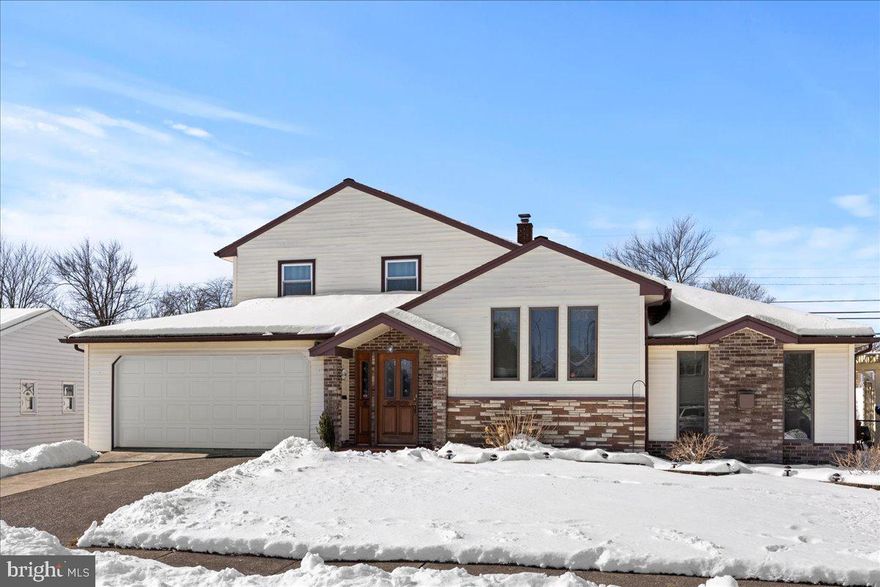 Welcome to this meticulously maintained single-family home, boasting an exceptional location with immediate access to major routes, shops, dining, schools, parks, and the airport, all while nestled within a serene neighborhood setting.
As you step inside, you are greeted by a welcoming foyer leading into the main entry hall, setting the tone for the spacious and practical layout of this residence. The expansive open dining area is a highlight, featuring a huge picture window and cathedral ceiling, perfect for hosting gatherings and creating lasting memories.
The updated kitchen is a chef's dream, offering a serving bar peninsula, stainless steel appliances, and granite countertops, blending style with functionality seamlessly.  Offset from the dining area is the large family room, complete with a cozy gas fireplace, ideal for relaxing evenings or entertaining guests.
The lower level adds versatility to the home, providing an additional recreation or gathering room, along with an updated powder room for added convenience.
Upstairs, you'll find two bedrooms and a fully updated bathroom featuring tile floors and a tub/shower combination. Additionally, the third bedroom or office space is conveniently located on the first floor, offering flexibility to suit your needs.
Outside, the property features an expanded driveway, an oversized garage with space for a workshop area, and a fenced rear yard providing privacy and security. Enjoy endless hours of relaxation and entertainment with the inground pool, complete with a newer pump and filter, and a paver patio perfect for outdoor dining and lounging.
This home boasts numerous upgrades, including a new HVAC unit, replacement windows, and hardwood floors throughout, ensuring comfort, efficiency, and timeless elegance. With its exceptional maintenance and thoughtful modifications from the original split-level design, this property offers the perfect blend of comfort, convenience, and style, ready to welcome you home.