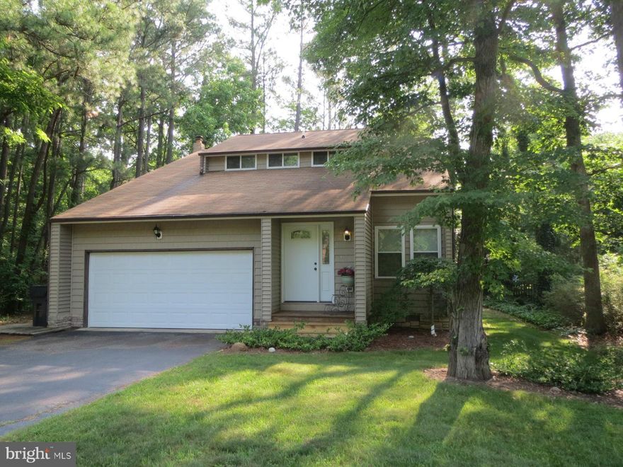 Charming contemporary  home  tastefully  remodeled & ungraded.  Beautiful kitchen w/ expansive granite island, subway tiled backsplash, stainless appliances, soft close cabinets & recessed lighting.  Open floor plan on main level w/ newer lament floors.  Spacious master bedroom w/ nice walk in closet. Great deck for entertaining & level backyard.  Convenient to Pax River.  Community beach access