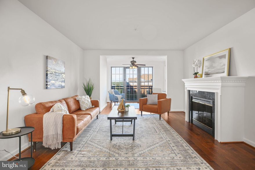 Step into this beautifully maintained condo with  water views from both the master bedroom and sunroom. Bright and open this home perfectly blends comfort, style, and modern conveniences. Step into an expansive living area featuring new hardwood floors and a cozy fireplace, flowing seamlessly into a separate  formal dining area. The open concept kitchen offers ample counter space, granite countertops,  stainless steel appliances and travertine tile floors. The spacious master suite boasts two walk-in closets and a large bathroom with a separate shower and dual-sink vanity. Additional highlights include a private sunroom, assigned covered parking (#71), and private storage. Recent updates include fresh neutral paint throughout, new light fixtures in both bathrooms, new faucets, updated water shut-off valves, and new blinds in the second bedroom. Enjoy resort-style amenities including an outdoor pool, party room, fitness center, tennis court, plus access to Belmont Bay HOA facilities, walking paths along the water, and the nearby National Wildlife Refuge. Commuting is a breeze with the VRE under a mile away, and quick access to Rt 1, I-95, and Potomac Mills Mall. This condo offers the perfect combination of luxury, convenience, and lifestyle.