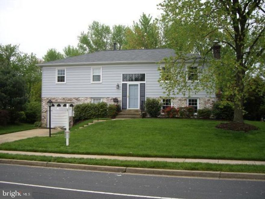 This home  will help make your family gatherings and holidays memorable! Beautiful split level with 4 bedrooms, 3 Full Baths, 1 car garage. Just renovated kitchen - stylish white cabinets, gorgeous granite counter, ceramic tile flooring and stainless steal appliances, door knobs, faucet. All bathrooms renovated- master bathroom, hallway bathroom on main level and the lower level basement bathroom. New recess lights in the living room. Formal dinning room new chandelier. Whole house r freshly painted.  Walkout basement family room with a cozy burning fireplace, 4th bedroom and 3rd bathroom. Large fenced yard with deck, patio and shed.  Lots of storage. Extra parking space on the driveway. Well kept and loved. No HOA!!! Close to public transportation, commuter lot, I66, Dulles Airport, shopping and restaurants. Short walk to Sudley Elementary school. AHS Home  Warranty .
