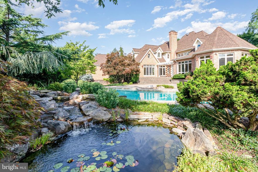 Spectacular, custom built home located just over 5 miles from Hershey Medical Center. A rare find, the home offers privacy on over 6 acres, but is also situated in a highly desirable neighborhood. From the moment you arrive, the craftsmanship is evident and every detail is thoughtfully planned.  Inside, the spacious rooms and flowing layout provide an ideal space for living and entertaining family and friends. The eat-in kitchen with upgraded countertops, a Sub Zero Refrigerator and a walk-in pantry will please the chef in the family. Plenty of counter space will make food preparation a breeze.  It flows into the spacious living room and also the sunroom where large windows flood the room with natural light. The formal dining room will be ideal for hosting holiday meals and has ample space for a large dinner party.  If you are working from home, the first level office will be the place for you. Watch movies in the theatre room- high ceilings and chandeliers give it a wow factor! The first level primary bedroom could also be used an in-law's quarters. A walk-in closet with built-in cabinetry and an ensuite with a walk-in rain shower and dual sinks complete the space. Ascend the grand staircase to the second level where 4 good size bedrooms and 4 full baths can accommodate family and guests. You will enjoy watching the big game in the lower level with the custom bar area, the custom wine refrigerator and the 9 foot pool table. If you enjoy outdoor living, this is  the house for you! Enjoy an in-ground pool, a koi pond and a pool house which offers a full kitchen with a Viking Grill, an island with seating for 8 plus a full and a half bath. The pool house has garage style doors offering the best of indoor-outdoor living. It is spectacular! In addition, the professionally maintained landscaping provides both beauty and privacy. With over 6 acres, there is also plenty of open space to play a game of catch! The attached 3 car  garage will save you from scraping ice and snow from your vehicle. The detached pole barn/garage can accommodate additional vehicles, an RV, a boat or use the space as a workshop!  Located within close proximity to the local airport, the train station and minutes from shops and restaurants,  Schedule a showing for your Dream Home! Imagine the memories you will make!