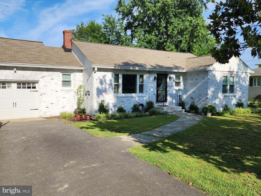 Beautiful One level brick home on Cox Creek.  Large lot almost 1 acre rolls out to the creek, private pier and boat ramp. 3 bedrooms, 1 full and 1 half bath. Bright living room at the entry, large great room off the back, with sliding glass doors leading to the backyard. This home is a real gem, totally gutted and remodeled in 2018. Looks like a brand-new home. Vinyl plank flooring in all common areas, carpeted bedrooms.  Home has public sewer, private well. The home has a large workshop with electric in the back yard with a second level with staircase for all your storage needs. Pets welcome on a case-by-case basis.