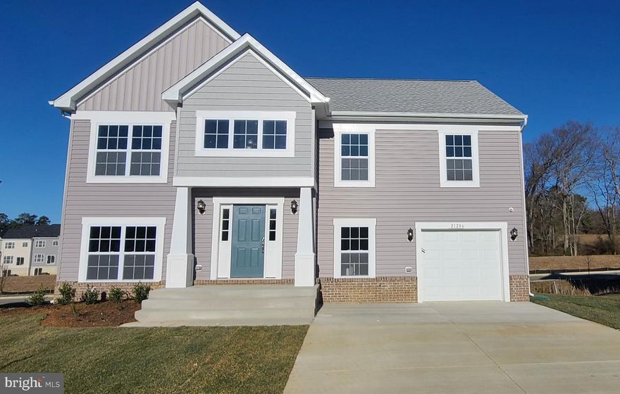 Sold & Settled custom layout Sotterly #2 at Elizabeth Hills. This home  located on a private lane is split foyer with design with a total of 3bd/3baths. Upper level features kitchen/dining and family room on one side of home with large cathedral ceiling and finishes such as granite counters, recessed lighting and stainless steel appliances, along with a fireplace and 10x12 composite deck with stairs to grade. Home also features custom owners suite layout with large walk in closet and full bathroom with double vanities and separate shower and soaking tub. Lower level will feature large rec room with 10x12 concrete patio out the back, along with a full bath and den/3rd bedroom and laundry room.  Vinyl plank flooring through many areas of the home, plus so many more cosmetic upgrades throughout!