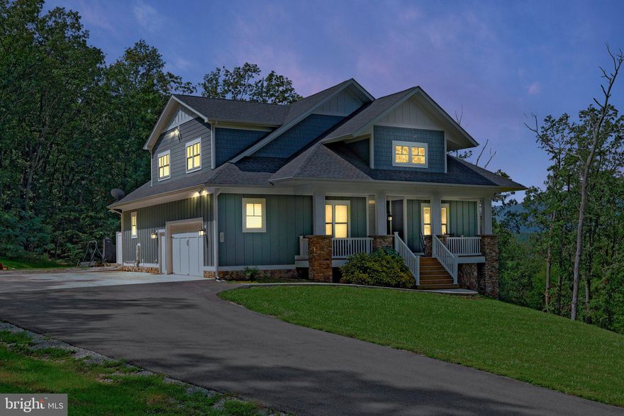 A beautiful Craftsman style home on 6+ acres in a peaceful, serene setting.   This home has amazing views. 
 This home is full of custom features and upgrades. Exterior features include pre-painted cement board siding, stone veneer, concrete patio, outside shower, sreened in porch and firepit. Moving inside, the main level features vaulted ceilings with exposed beams, double sided fireplace, mud room with built-in lockers and a Primary bedroom with spacious, well appointed bath. The primary closet is all custom cabinetry and built-ins.  The kitchen has custom soft close cabinetry, upgraded countertops, center island and top of the line appliances.  Paved driveway.