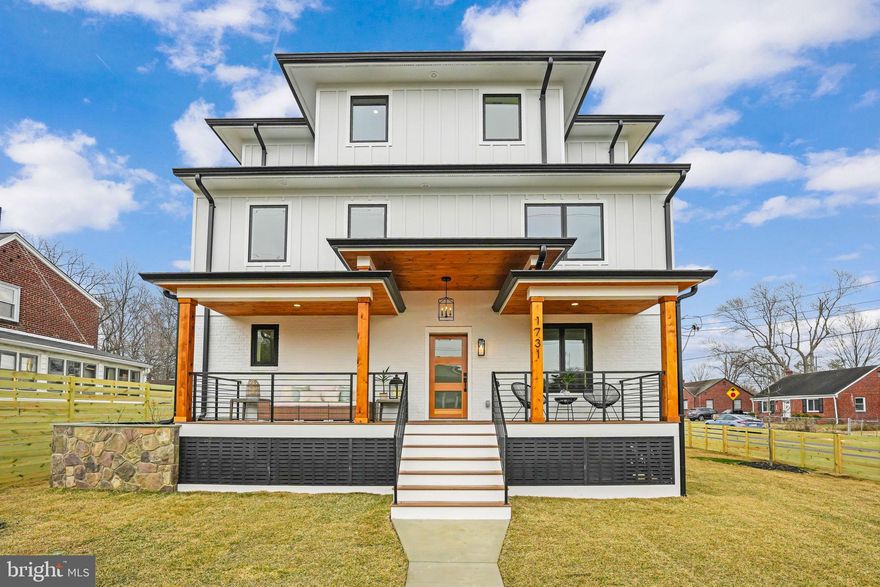 NEW, NEW, NEW!! Spanning approximately 3,900 finished square feet across three levels, this residence features 5 spacious bedrooms and 5 luxurious baths, along with an office/study that can easily serve as a 6th bedroom. One of the standout features is the expansive top-level loft, filled with natural light, providing an ideal space for entertaining, working, or simply unwinding. This level also includes a full bath and bedroom, enhancing its versatility.The exterior showcases approximately 40% painted brick and 60% Board and Batten Hardiplank, complemented by a brand new architectural roof, sleek black Marvin casement windows, and a stunning mahogany front door. Inside, the main level boasts an open-concept design with a gourmet kitchen, complete with quartz countertops and stainless steel appliances, flowing seamlessly into a spacious living area featuring a cozy gas fireplace and French doors that open to a private, fenced backyard. The grand owner’s suite is a true retreat, featuring walk-in closets and a luxurious en-suite bath. Two more bedrooms and hallway full bath complement the second level. The finished basement adds even more appeal with a large recreation room, wet bar, legal bedroom, gym, full bath, and generous storage options. Step outside to enjoy the covered porch or large rear deck, perfect for gatherings or quiet relaxation. The 1.5-car garage and extended driveway easily accommodate a few compact vehicles.