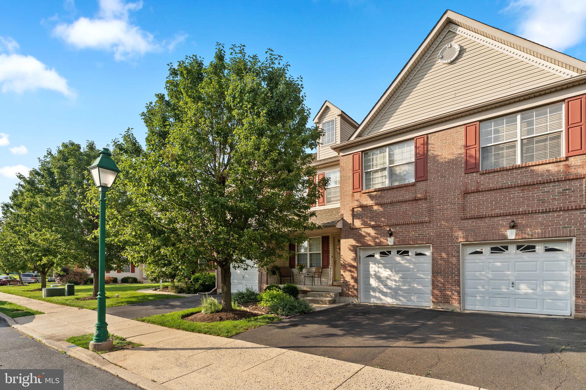 Welcome to this exquisite townhome, where meticulous maintenance meets luxurious living. Nestled in the desirable North Penn School District, this residence offers an unparalleled blend of sophistication and comfort. The expansive layout, adorned with soaring cathedral ceilings, creates an ambiance of openness. The living room features a stone accent wall completed in 2020, creating warmth and charm, making it the perfect space for both relaxation and entertaining. The updated kitchen boasts newer appliances, modern finishes, and ample counter space, ideal for gourmet cooking and hosting gatherings. Ascend to the upper level to discover a generously sized master bedroom complete with a walk-in closet and expansive master bathroom. Two additional spacious bedrooms provide ample space for family or guests, with abundant closet storage throughout. The recently renovated bathrooms, including the upstairs main bathroom (2021), and the first-floor powder room (2023), feature contemporary touches that elevate the home’s appeal. Step outside to enjoy your private backyard oasis, which backs up to open grassy space—perfect for dining, entertaining, or simply unwinding in serene surroundings. Notable updates include the entire house being repainted (2020), hardwood flooring on the first floor (2020), stylish kitchen backsplash (2020), kitchen cabinet refacing (2020), plush new carpet upstairs (2022), and a brand new garage door with WiFi enabled capabilities (2023). Located just minutes from grocery stores, shopping centers, dining options, and major roadways including PA 476, PA 276, Route 309, and Route 202, this home combines suburban charm with unbeatable convenience. This move-in ready gem is a rare find in the North Penn School District. Schedule your private showing today and seize the opportunity to own this luxurious townhome!