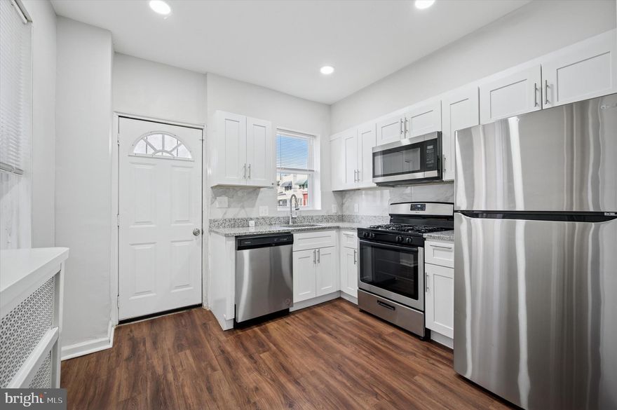 Welcome to 5533 Kingsessing Avenue, a beautifully updated 3-bedroom, 1-bath home located in the heart of Philadelphia’s Kingsessing neighborhood. This charming rowhome offers a perfect blend of classic city character and modern finishes, ideal for buyers seeking move-in-ready convenience with a contemporary feel. Step inside to an open-concept main level featuring recessed lighting, wide plank flooring, and generous natural light throughout. The living and dining areas flow seamlessly into a fully renovated kitchen complete with white shaker cabinetry, granite countertops, a sleek tile backsplash, and stainless steel appliances. Upstairs, you’ll find three spacious bedrooms with ample closet space and a refreshed full bathroom. The clean, expansive basement offers laundry and storage with potential for future finishing. Out back, enjoy a private outdoor space perfect for relaxing, entertaining, or letting pets play. Conveniently located near public transportation, local shops, schools, and parks, this home is a great fit for first-time buyers, investors, or anyone looking to settle into a thriving West Philadelphia community. 5533 Kingsessing Avenue is a turn-key opportunity with the comfort, style, and location to match.