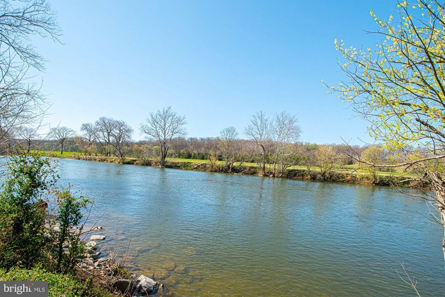 This spacious Contemporary style 2 BR 2 BA Retreat fronts a county/state maintained paved road, with easy access to/from nearby Rt 50 West and I-66 West for commuters.  It is also located across from a subdivision road that leads to the Shenandoah Farms Riverview Boat Landing—a private community amenity, providing boating, fishing, and swimming access exclusively for Shenandoah Farms property owners.  The land lays well and offers abundant parking for cars, trucks and boats and has a designated picnic area, perfect for hosting family and friends while engaging in recreational and river time fun.  This property needs some "TLC" so it is listed for $55,000 under the 2025 real estate tax assessment of $304,900 for Lot 86 & Lot 87 (both fronting Howellsville Rd with 1.378 acres combined) and is already priced to reflect any repairs or improvements that a buyer desires to make.  The roof was updated in 2010 with 50-year roof shingles.  The sellers are in the process of getting pricing for repairs to the septic system that they just learned about, which they plan to have remedied by a professional septic company.  Note that all of the files for septic and wells, previously kept at the Warren County Health Dept. were transferred a number of years ago to an office in Richmond, which was not able to locate a copy of the septic permit specifying the # of bedrooms that the septic system was designed for, when a request was made for this.  So although it is estimated that the septic system was designed for (2) bedrooms, the actual # of bedrooms that the septic system is designed for is unknown.  As shown in the photos, the main level of this home offers a spacious covered front porch that protects from the weather, perfect for your favorite plants and relaxation while stretching out on a chaise lounge, sipping your favorite beverage.  Once inside there is a living room, separate kitchen with a pass-thru, dining/ family room with an electric built-in fireplace for ambiance, a main level bedroom and full bath.  A sliding glass door that had formerly been the main entrance to the front of the house, was removed and boarded up on the outside when new sheetrock and new flooring were installed in the living room in the past as an upgrade, at which time a new main entrance door was installed which has been used since.  However, the sellers say that a new sliding glass door can be installed where the sliding glass door was removed, for a 2nd front entrance to the house.  The upper level of the house offers a very large room that can be used as an office, a game room, and/or family room and has (2) sets of sliding glass doors that open onto an upper-level spacious covered front porch. There is also a 2nd full bath with a walk-in shower, and a 2nd bedroom which opens onto a rear deck. Note that this rear deck is an item that is in need of repair so the sellers have placed a sign on the sliding glass door leading onto it, that no one is to walk out onto this upper rear deck showings, to ensure the safety of all.  The heat source on the main level of the house is a hook-up for a propane wall heater in the living room and electric baseboard heat in the bathroom.  The heat source on the upper level of the house is electric radiant heat in the ceilings, an electric baseboard heater in the 2nd upper-level bathroom, and vent openings the floor of the large office, or game, and/or family room directly above the living room which was heated with propane heat from a propane wall heater behind the entrance door to the house.  The house does not have a central air system for cooling.