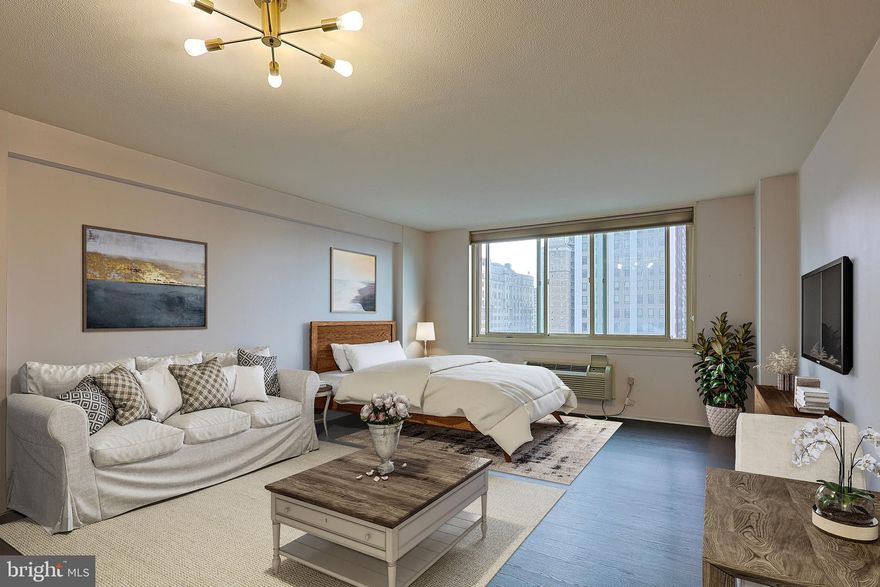 This South side, 462 sq ft studio on the 13th floor at the William Penn House in desirable Rittenhouse Square has been beautifully updated.  Kitchen features lots of cabinet space, granite countertops and counter window to the dining area.  Lovely updated bathroom.  Newer hardwood flooring throughout. This building features 24-hour Security and Doorman, On-Site Management and Maintenance, Rooftop Pool with amazing views of the city. On premise VALET Parking available for 80 per month for one car. THE MONTHLY FEE INCLUDES ALMOST EVERYTHING: All Utilities including electric, heat, air conditioning, water & basic cable, All Real Estate Taxes & Maintenance Package. This unit has an abundance of closet space & newer windows. This spectacular building has NEVER HAD AN ASSESSMENT! Nominal real estate transfer tax & no title insurance required. Experience the ability to walk out your door to first class, 4-star restaurants, fabulous shopping & all the conveniences of this sought after neighborhood. Walk score is a 98! One time admin fee paid at closing.