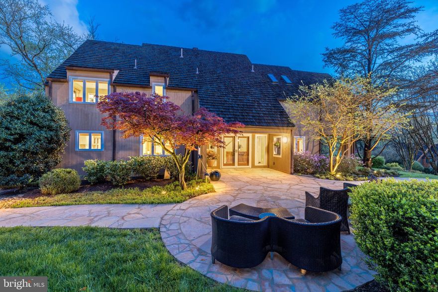 You will feel like you are living at a retreat in this modern light filled house with spectacular views from every window of the lushly landscaped which includes a pool & spa and extensive hardscaping * This mint condition house has 4900 sf of living on three levels and has been updated throughout including an owner's suite addition done by Bowa Builders *  All three levels have lots of natural light, large double paned windows,  LED lighting  and bamboo flooring *  Main level special features include: airy two story foyer, large living room with 17 ft ceiling and large wood burning fireplace; a front office with walls of built-ins and storage shelves; modern style kitchen Neff cabinetry, granite countertops, pantry and storage closets, two dishwashers, Dacor cooktop, stainless steel refrigerator, oven and microwave and a breakfast nook; family room adjoins kitchen and has sliding glass door to large deck * Upper level special features include: the owner's suite with 10 ft ceilings, large walk-in closet with built-ins, blackout shades, platform bed, sitting room and luxury bath with oversized jet system shower, air bubble tub, two vanities and skylights; two additional bedrooms including a double sized bedroom that can be returned to bedroom #3 and #4; and hall bath and laundry combination: Walkout Lower level special features include: separate entry for a complete in-law or nanny suite including a full kitchen with dishwasher, electric cooktop, refrigerator, double ovens, microwave, sink and garbage disposal; full bath; spacious recreation room with wood burning fireplace and triple glass sliding door to patio, exercise room with mirrored wall and two storage closets and two utility rooms. The entire property is lushly landscaped with a beautiful front entrance and a treelined driveway, professionally designed flower and shrub gardens and a automatic drip irrigation system and extensive Lutron programmable lighting system, a Tennessee flagstone front entrance and guest parking pad with stone wall and walk ways to the pool area and boulder step pathway from front patio  to the back patio * The heated pool and spa include a slide, diving board and child safety retractable pool cover * The detached garage is equipped with an EV Charger that can be expanded for a second garage * Off the main level is an expansive Zuri premium  with gas line for grill and stairs to pool area * There is a Generac generator that covers 90 percent of the power needs * IMPORTANT! Please see (in documents) the extensive list of capital improvements the sellers completed over the last 20 years * The Leigh Mill Homeowners Association is comprised of 18 homes on approximately one acre lots. In addition, all the homeowners have use of the community  19 acres which includes an open field, a playground, a tennis court (which may be available for pickle ball) and adjacent basketball court * 9203 White Chimney Lane is the first grouping of six houses  in Leigh Mill Homeowners Association with the remaining 12 houses at the end of White Chimney ending in a cul de sac.  Enjoy hiking on the Difficult Run Hiking path next to the neighborhood that you can enter off Mill Creek Landing and hike all the way to the Potomac River and Great Falls National Park.  This location is very assessable to Tysons, the Silver Line Metro and Dulles Airport and just minutes to the quaint Village of Great Falls.