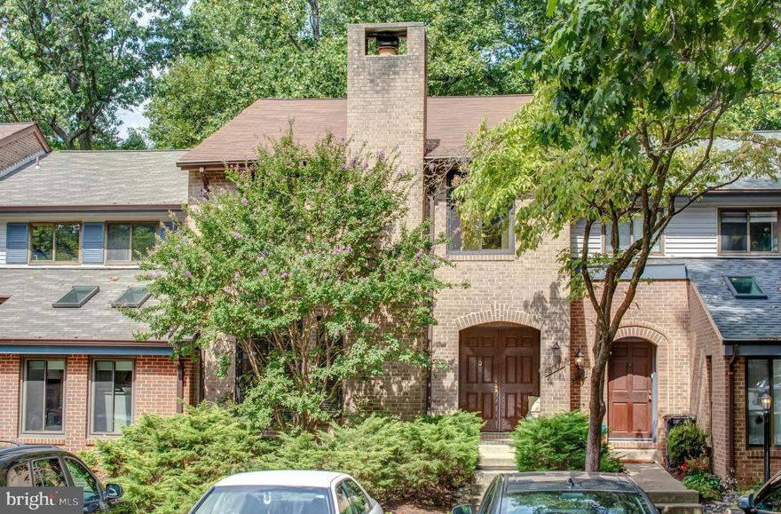 BEAUTIFUL 3 level brick townhome with an amazing views of lake Barton from the Living and Dining rooms, large deck, Master Bedroom, upstairs hallway, and lower level and situated in the back of the cul-de-sac.  There is  beautiful Brazilian hardwood floors on the main level, stairs going up and the hallway between the bedrooms.  Updated kitchen opens to family room with wood burning fireplace, nice size living room and dinning room.   There are 4 bedrooms, 3 1/2 bathrooms and lovely master bathroom with dual sinks and glass shower, walk-in closet, and an updated 2nd bathrooms.  The lower level has a rec room that walks out to the patio, a nice size  bedroom in the basement with a walk-out door, walk-in closet, and full bathroom. huge laundry and storage room.  Outside lower level has a storage shed.  Walking trails all along the lake. Offers two parking spaces in front of the townhouse.  Conveniently located close to shopping and restaurants.