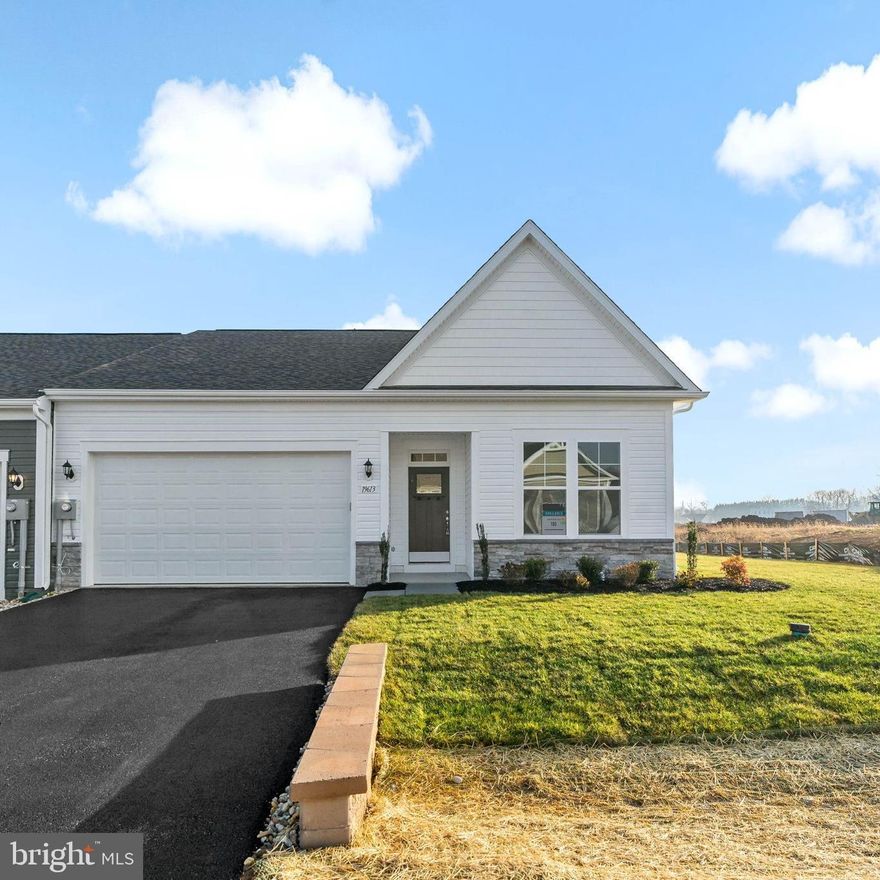 *OFFERING UP TO $15,000 IN CLOSING ASSISTANCE WITH USE OF PREFERRED LENDER AND TITLE.*
Move in Ready! End of row, spacious single level home! Fabulous community of 55+ adults! This fabulous floor plan is open with a sun-filled morning room, cozy corner gas fireplace,  a kitchen with a vaulted ceiling, stainless steel appliances, an island with pendant lighting, designer selected upgraded cabinets, quartz countertops, flooring and lighting packages. The primary bedroom features large walk-in closet with a primary bath with frameless shower door.