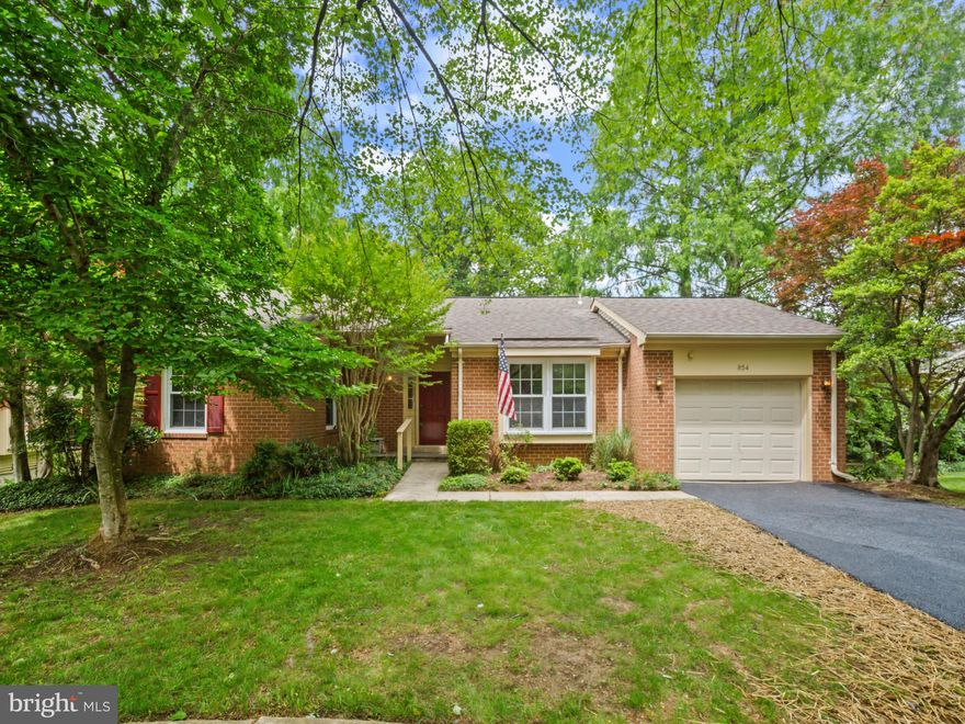 This Golfers Ridge single-family home in Heritage Harbour is located on a friendly cul-de-sac and backs to peaceful and private woods. Easy access from the garage to the kitchen or from the front door into the foyer. Lovely warm original parquet floors flow throughout. The kitchen has a user-friendly peninsula and extra glass-front cabinets for plentiful storage. The kitchen is bright and sunny with south-facing windows and a side window facing the front entry. Large and open living and dining areas provide space for entertaining friends or family for holiday dinners or casual gatherings. The cozy east-facing sitting/tv room has access to the corner deck via sliding doors. Each living area offers woods-facing privacy and distance from neighbors. The corner deck offers the ideal space for summer dining or just enjoying the birds and the sounds of summer. The main floor laundry offers the convenience of easy access from both bedrooms. The primary bedroom has an ensuite bath with double sinks and a walk-in shower, and has a large walk-in closet. The guest bedroom has a full closet for additional storage, and hallway access to a second full bath with a tub/shower combination. Now for the bonus! A bright open stairwell with a large window and a landing is carpeted, and offers easy access to a huge basement that runs the full length of the home. The basement glass slider provides outdoor access and tons of light. Perfect for a third bedroom for guests or an entertainment space for the "grands." The lower level features a half-bath, large walk-in closet, and a separate room for additional storage space, an office, or a media room. If you are down-sizing, this is an elegant storage solution for all those cherished items that you are not ready to part with! Neighborhood amenities include indoor & outdoor pools, tennis & pickleball courts, 9-hole, par-3 executive golf course, on-site restaurant, theater room, a billiard room, woodshop, library, and more. Clubs and activities include Zumba, movie nights, dinner club, mahjong, dancing, bocce ball, horseshoes, kayaking, biking, remote-control sailing, and more. This is the ideal solution for downsizing...quiet single-family, one-level living in a sought-after Heritage Harbour location...with tons of storage!