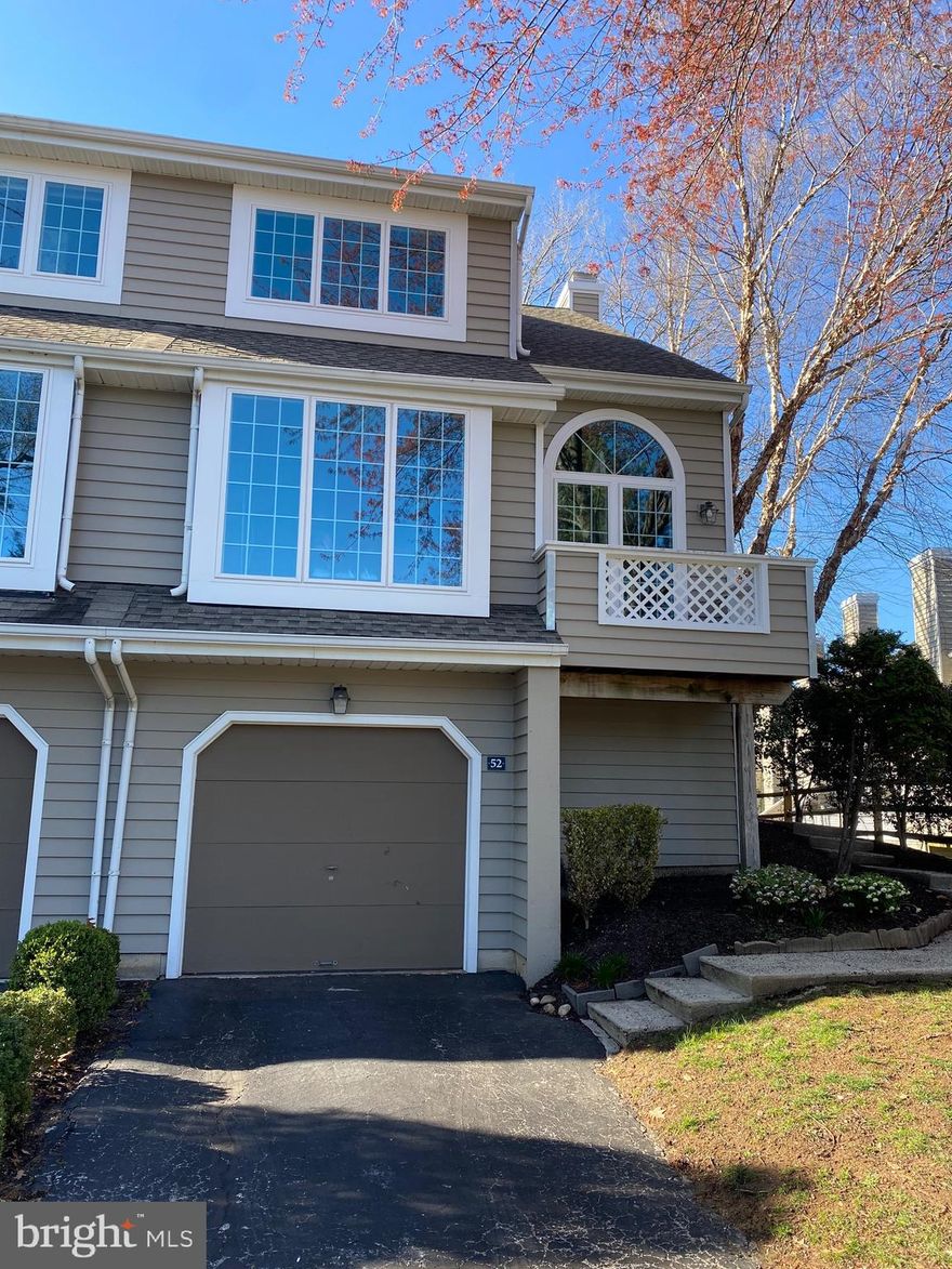 52 Cabot is located in the sought after Newport neighborhood of Chesterbrook, where it is conveniently located close to shopping, restaurants and Valley Forge Park. The open floor plan of this end unit townhome is filled with natural light from large windows and sliding doors which open onto a large deck. The floating staircase adds architectural interest. A vaulted ceiling adds to the open space which is perfect for entertaining. Upstairs are two spacious bedrooms and the primary suit has a large soaking tub and separate shower. A lower level walkout finished room with powder room can be used as a 3rd bedroom, office or gym.
The garage has a large side space for extra storage and an additional enclosed storage space too. Renovated in 2020, with new roof, new hardwood floors, new windows, new HVAC system and new appliances. Community exterior was painted in 2023 Found in the Tredyffrin Easttown school district, this home is not to be missed.