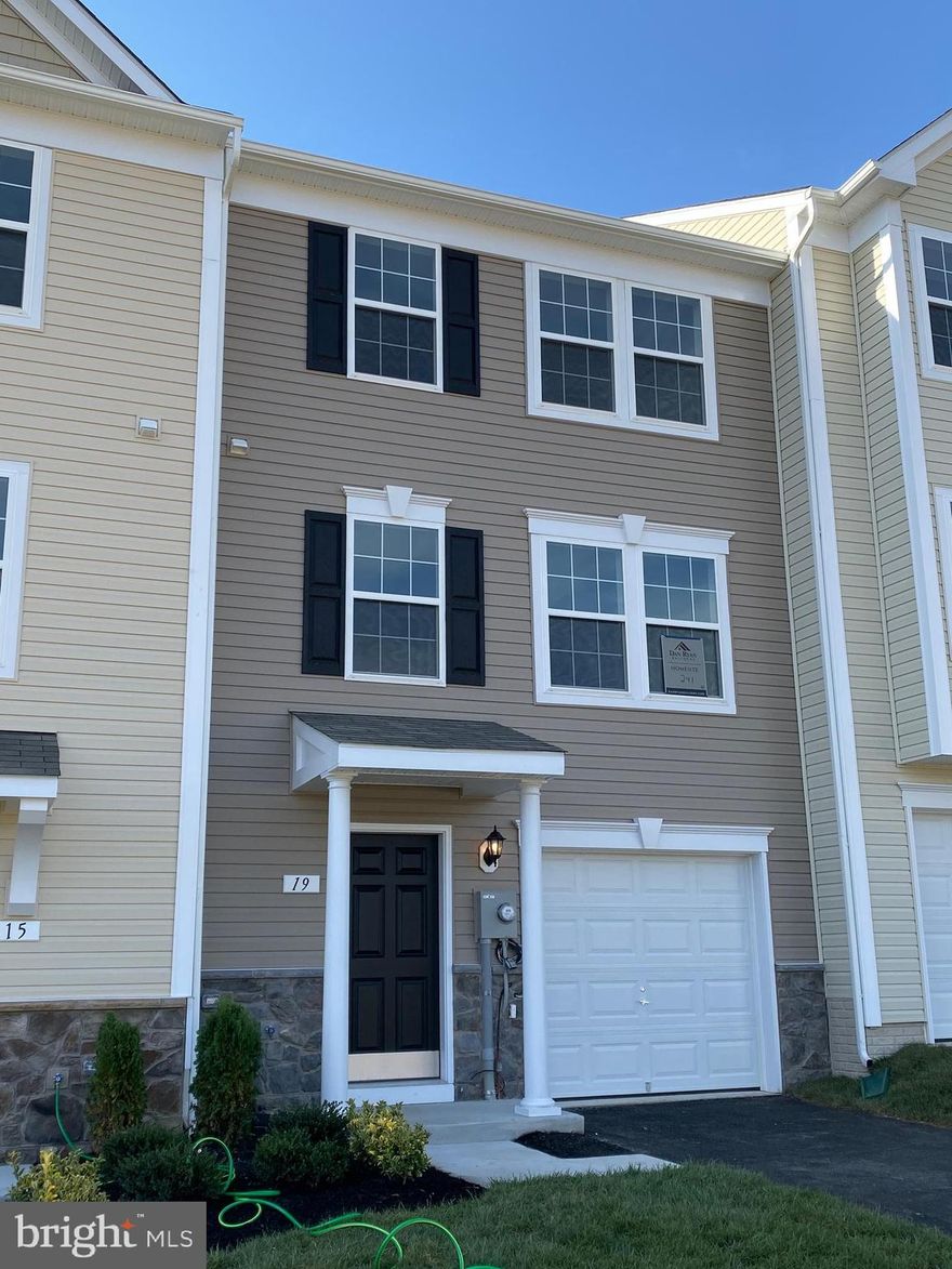 IMMEDIATE DELIVERY! READY NOW! Don't miss your chance to own at Stonebrook Village! 100% FINANCING & CLOSING COST MONEY! York II garage town, stainless appliances, Granite countertops, 42" cabinets & kitchen island, finished lower level rec room with walkout & bath rough in.* Photos may differ from actual home*