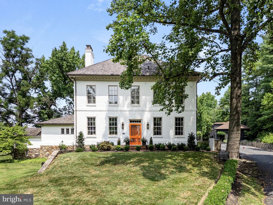 Anchored in history and set on 25 pastoral acres, this distinguished Georgian brick manor, dating to circa 1769, has been thoughtfully reimagined. More than $1 million in carefully executed restorations ensure the architectural heritage remains intact while introducing contemporary comforts. With over 4,200 square feet of beautifully finished living space, the residence unfolds across three levels, offering four generously proportioned bedrooms and three and a half refined baths. Historical  authenticity remains at the heart of the home, where original  elements such as Flemish bond brickwork, original mantels, and hand-crafted wood details have been meticulously preserved. Enhancing its 18th- and 19th-century roots are numerous integrated modern upgrades, including double-pane windows throughout, six working fireplaces converted to gas. Additional modern comforts include central heating and air conditioning, elevator, and a spacious chef’s kitchen with high-end appliances.

Complementing the main residence is a classic Pennsylvania ventilated brick-end bank barn, featuring a carriage house that has been adapted for modern living with a luxurious, thoughtfully designed private two-bedroom, one-bath suite on the lower level.

The property also includes exceptional auxiliary structures designed for both function and lifestyle. A state-of-the-art, temperature-controlled four-car garage doubles as a full CrossFit gym, complete with wall-to-wall floor mats, oversized 20-foot doors for natural light, a Lululemon Mirror, and a Tesla charging station. An additional two-car garage includes a temperature-controlled upper-level office with its own lounge and reception area—offering a refined private workspace just steps from the main house.

The grounds of this estate offer an unparalleled sense of tranquility. A surrounding privacy wall with dual gated entrances provides both elegance and security. The landscape unfolds with breathtaking vistas, two private ponds, and over half a mile of frontage along Israel Creek—an idyllic sanctuary, perfectly suited for those seeking refined seclusion and natural beauty.

Perfectly positioned just minutes from the vibrant heart of historic downtown Frederick, this estate offers immediate access to charming boutiques, award-winning restaurants, local wineries, and a thriving arts scene. Outdoor enthusiasts will appreciate the proximity to Catoctin Mountain Park, the Appalachian Trail, and the scenic beauty of nearby vineyards and equestrian estates. For those seeking convenience and connectivity, the property is ideally located within an hour’s drive of Washington, D.C., Baltimore, and Northern Virginia—making it a seamless commute for professionals or a luxurious weekend retreat for city dwellers. Major transportation routes and MARC rail service provide additional ease for travel throughout the region.

This is a truly exceptional opportunity to own a legacy estate where history, luxury, and natural beauty converge in perfect harmony.
