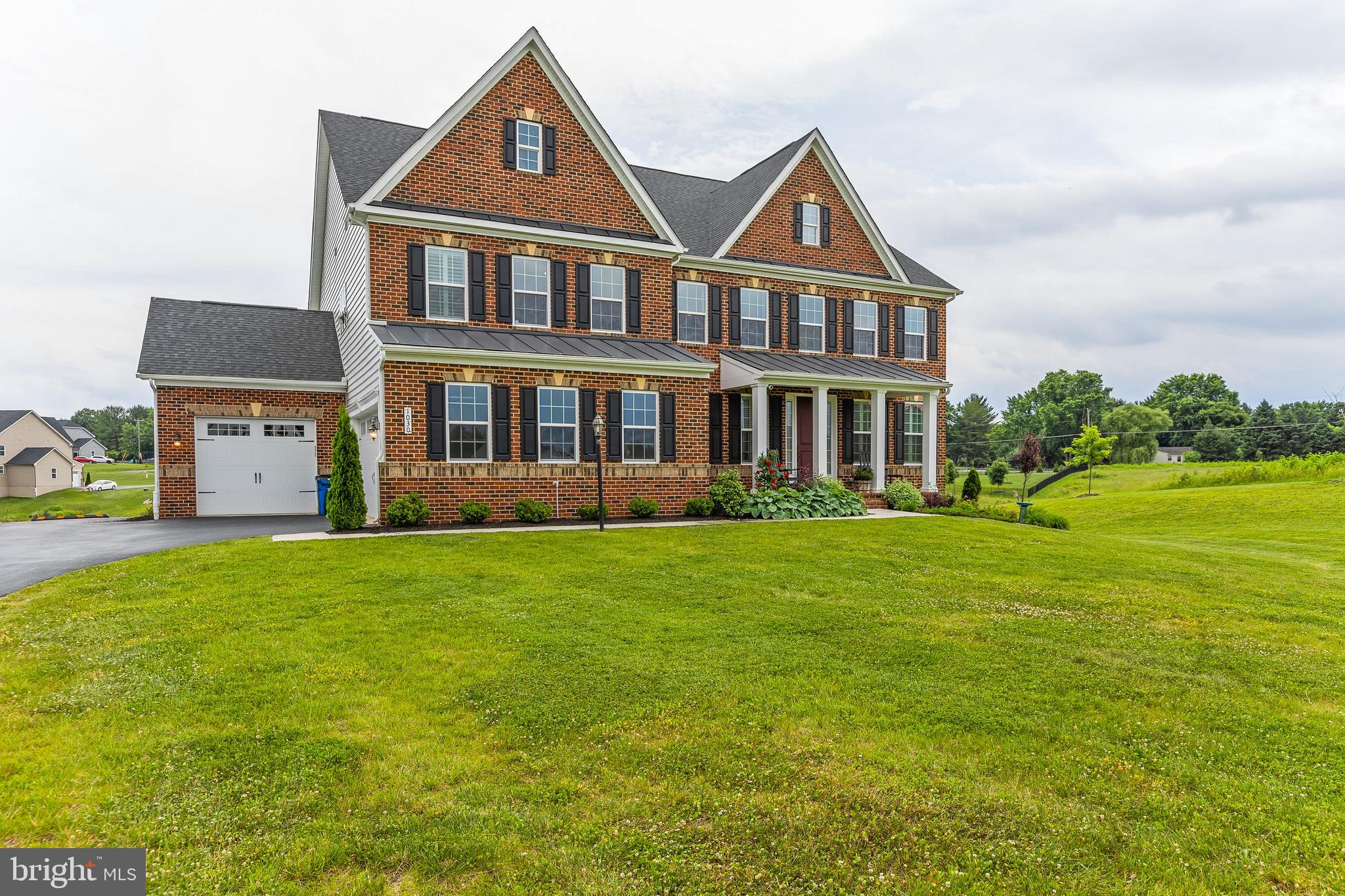 This impeccable NV Homes Stratford Hall model is finely appointed and is where luxury lives. Situated in the sought after Fairlane Estates offering magnificent sunsets and wide-open views! Upon entering the light-filled foyer, where the adjoining sitting room offers versatility and a formal dining room perfect for entertaining. A wonderfully tucked away office makes working from home easy and peaceful. Off the 3-car garage, a family entry welcomes you to the gourmet kitchen featuring extended custom cabinets, granite countertops, stainless steel appliances, an expansive center island overlooking the 2-story family room with beautiful coffered ceilings, easy access to the butlers pantry and dining area. Upstairs, 3 additional bedrooms each including ensuite baths and loft space for relaxing. The luxury owner’s suite featuring an exquisite tray ceiling, 2 enormous walk-in closets, luxurious ensuite bath with soaking tub, oversized spa shower and a double vanities. The fully finished walk out basement, offers a wet bar, gym, bedroom with private bath, spacious recreation room and loads of storage! Enjoy your summer evenings relaxing on the covered porch and patio! This one will not last!
