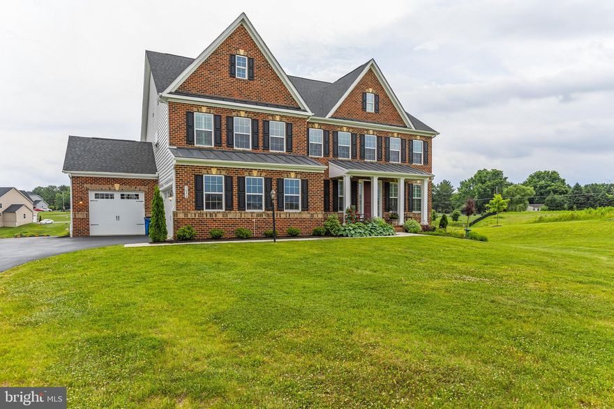 This impeccable NV Homes Stratford Hall model is finely appointed and is where luxury lives.   Situated in  the sought after Fairlane Estates  offering magnificent sunsets and wide-open views!  Upon entering the light-filled foyer, where the adjoining sitting room offers versatility and a formal dining room perfect for entertaining.   A wonderfully tucked away office makes working from home easy and peaceful.  Off the 3-car garage, a family entry welcomes you to the gourmet kitchen featuring extended custom cabinets, granite countertops, stainless steel appliances,  an expansive center island overlooking the 2-story family room with beautiful coffered ceilings, easy access to the butlers pantry and dining area.   Upstairs, 3 additional bedrooms each including ensuite baths and loft space for relaxing. The luxury owner’s suite featuring an  exquisite tray ceiling,  2 enormous walk-in closets,  luxurious ensuite bath with soaking tub, oversized spa shower and a double vanities.   The fully finished walk out basement, offers a wet bar, gym, bedroom with private bath, spacious recreation room and loads of storage!   Enjoy your summer evenings relaxing on the covered porch and patio!    This one will not last!