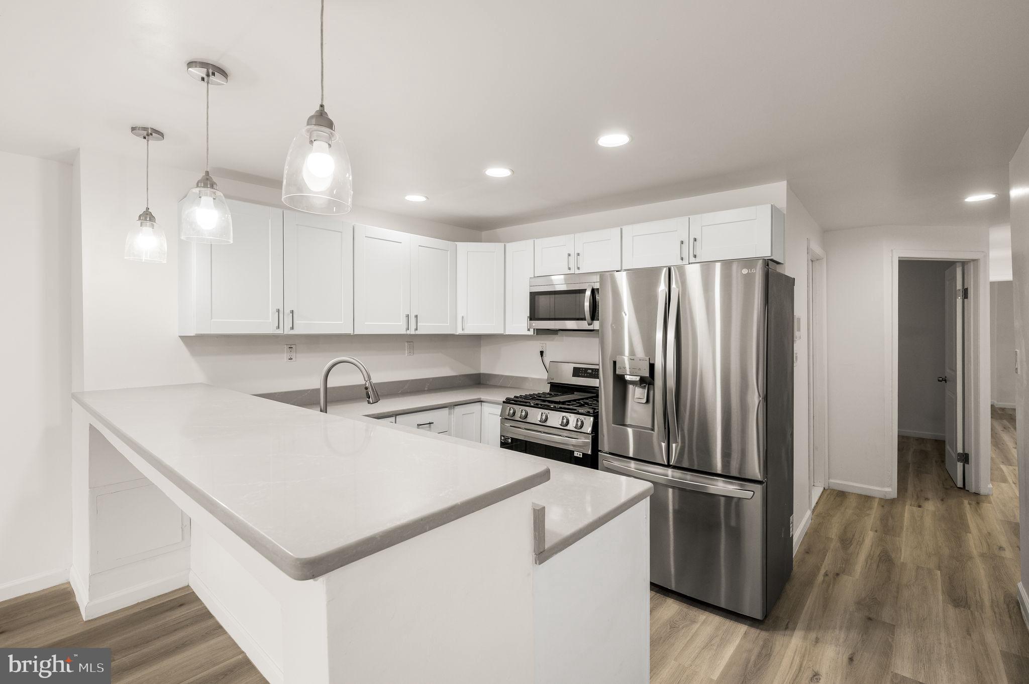 Now leasing! Welcome to your bright & beautifully renovated 2-bedroom, 1-bathroom home on the 2nd floor of 1633 Germantown Avenue in the vibrant Olde Kensington neighborhood. This spacious, light-filled unit features a modern open-concept layout, brand new flooring, sleek quartz countertops, and stainless steel appliances, making it the perfect place to relax or entertain. Both bedrooms are generously sized with ample closet space, and the remodeled bathroom boasts a luxurious walk-in shower. Step outside and explore everything Olde Kensington has to offer, from the bustling shops and cafes like ReAnimator Coffee and Laser Wolf to local parks such as Liberty Lands Park and Girard Avenue Park. You’ll love the convenience of easy access to public transportation, bike lanes, and major highways, putting all of Philadelphia at your fingertips. Don’t miss the opportunity to make this beautifully updated unit your new home—schedule your tour today!