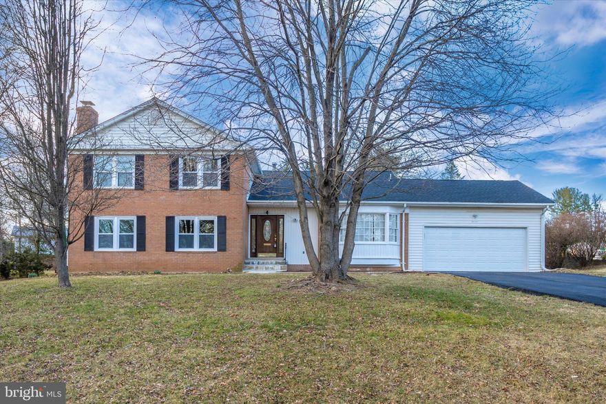 LOCATION!!! Gorgeous brick front 5 Bedroom, 3.5 Bath, home with 2 Car Garage situated  in the desirable Stonegate  community! The main level features a completely Remodeled Luxury kitchen with NEW Stainless Steel Appliances, Premium Calacatta Quartz countertops,  Contemporary lights and more! Upper level offers 4 Large Bedroom including Master Suite and 2 Full bath. Heading downstairs we have a spacious Living room, Familyroom, 1 Bedroom and a 1.5 bath. Fully finished Basement. NEW Roof, NEW HVAC, NEW Washer&Dryer, NEW Vinyl throughout the house, Several LED Recess Lights, Freshly Painted, Insulated GarageDoor, Luxury Bathrooms with Premium Calacatta Quartz Vanities. Commuter routes including I-495, I-95, and Route 29 offer convenient access to DC Metro Area, Close to the community pool! Easy access to ICC. Nearby shopping, dining, and entertainment options. An absolute must-see!