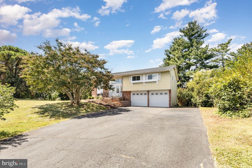 Nestled on a sprawling 1.24-acre lot, this exquisite Mid-Century Modern residence with over 2600 SqFt . Step inside to discover a dual staircase entry and interior with all new LVP flooring, new kitchen and baths, new windows new plumbing lines and electrical outlets.   Be sure to check out the cost of these improvements saving you  about 100K out of pocket.  Three spacious bedrooms and 2.5 bathrooms open living room, kitchen that opens to a huge deck.   Large lower level daylight rec room with wood burning firplase ensuring ample space for relaxation and privacy. There is another finished room in the basement that could easily be turned into a 4th bedroom.  New HVAC just installed. LOCATION,LOCATION,LOCATION.