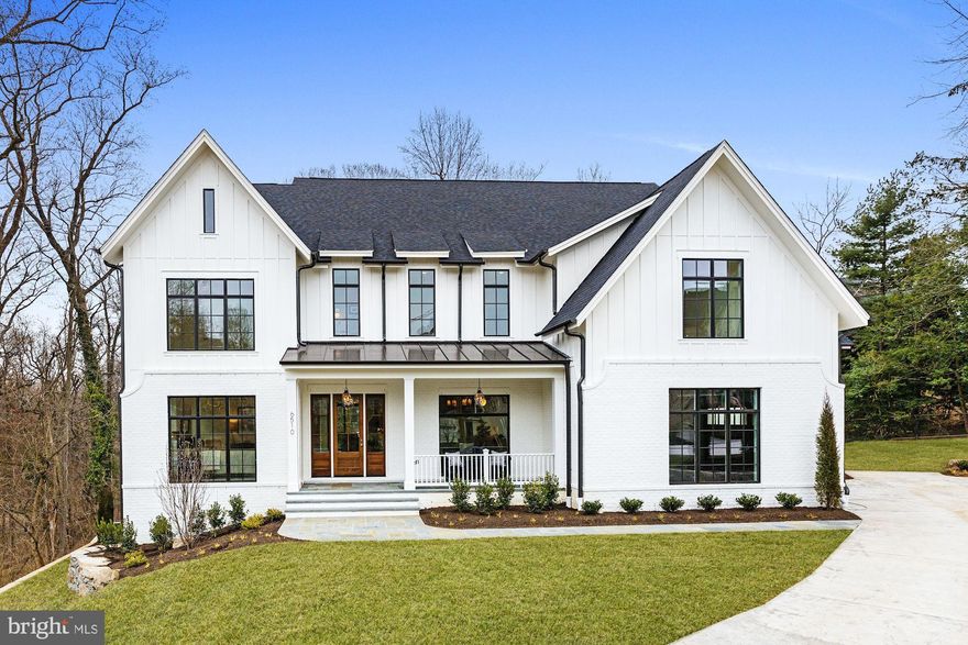 Offering amazing views on almost an acre, Brush Arbor's newest offering is a WC Ralston designed transitional application of a classic home.  Come see a new standard in the application of traditional elegance and contemporary convenience, situated with fantastic proximity to downtown McLean in the sought-after neighborhood of Salona Village.  Almost 8000SF with incredible backyard views through picture windows, four outdoor spaces including a private deck off the owner's suite and a covered porch with fireplace. The gracious floor plan provides open concept living, coupled with the expected and lovely formal spaces, two staircases, 5 bedrooms upstairs, oversized mudroom and pantry, 3 garage spaces, a walk-out lower level, elevator shaft, etc.  Every Brush Arbor home includes white oak wood accents and floors, Jeld Wen windows and doors, and designer bespoke finishes such as lighting by Currey, Circa + Visual Comfort.  Each home also delivers with an installed Nuvo audio system, heated tile in the master bath, tiled pedestals in laundry rooms, exterior gas lines for a future-grill, pre-wiring for electric screens on rear covered porches, and pre-wiring for a generator.