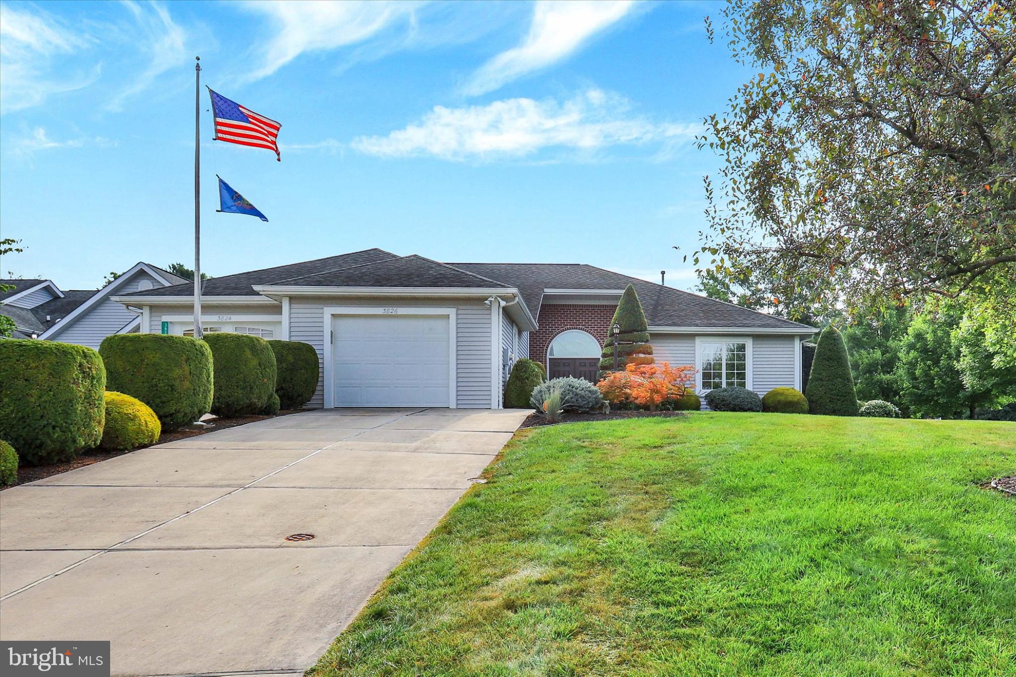 Welcome to the Farmington Neighborhood in award-winning Penn National Community! Two bedrooms, two full baths, and a half bath are on the main level, lots of natural light. Primary suite features a walk-in closet, soaking tub, and both full bathrooms have dual vanities. Second bedroom has dual closets. Easy access to beautifully landscaped yard. Kitchen is equipped with gas range and oven, with both a breakfast nook, and formal dining area. Sliding doors lead to rear deck. The finished lower level is a must-see, also with walkout access to the back yard! Custom brick fireplace, full bath, dining area, spacious walk-in closet, and complete kitchen! Great potential for an in-law suite. Plus lots of room for storage! HOA fee is $80 per month, and covers lawn maintenance and snow removal. Penn National Community offers extensive amenities, including 36 holes of 4-star golf, an outdoor pool, tennis/pickleball courts, yoga classes, a community garden, more than 40 social clubs, and a restaurant + bar. For more details on memberships, visit the pro shop!