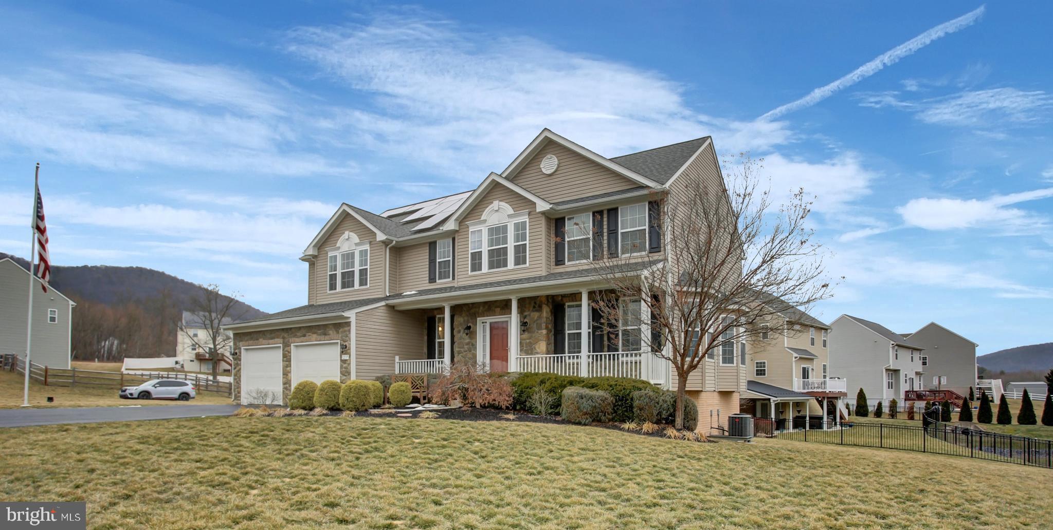 Welcome to this stunning Colonial home, In Upland Estates. This beauty boasts over 3,000 square feet of above-grade living space. If you are looking for space to spread out this is the one for you! Home has a traditional floor plan with a modern flare! This exquisite former model home is brimming with upgrades and exceptional features. With 4 spacious bedrooms and 3.5 baths, this property offers ample space and comfort for all. Step inside to find a main floor designed for both functionality and elegance. The open kitchen is equipped with modern appliances, granite counters, tall cherry cabinets with trim, and complemented by a breakfast room addition, creating a perfect space for gatherings. The family room, formal dining room, and formal living room provide a variety of spaces for relaxation and entertaining. The upper level is home to a magnificent master suite, measuring an impressive 17x20 feet. The ensuite bath features a soaking tub, separate shower, and a water closet toilet area, offering a private oasis within your home. The suite also includes a spacious walk-in closet. Three additional spacious bedrooms and a large hall bath complete this level, providing comfort and convenience for the entire family. The finished basement is a versatile space, featuring a large recreation room, a full bath, a huge storage room, and an at-grade walk-out. This area offers endless possibilities for use, from a playroom to a home theater and/or fitness space. Enjoy breathtaking mountain views while being conveniently close to local amenities. Easy drive to local shopping and only a 25 minute drive to Historic Gettysburg and 30 minutes to Liberty Mountain Ski Resort. This home is also equipped with Sunnova solar panels, significantly reducing your electric payment to a modest $9-$13 monthly OR often times the solar creates a credit in electric with no bill at all! The panels are financed with a small payment, resulting in a combined cost that is lower than typical usage expenses for a home of this size. Sellers are offering an amazing credit of one years worth of solar financed payments. Credit of $2700 applied at closing and can be used as buyers choose. Finance Agreement transfers to the new owners to continue enjoying these great rates! At the end of the finance agreement the panels are fully owned by homeowner. Don't miss the opportunity to make this remarkable home yours, offering a perfect blend of style, comfort, and efficiency.
