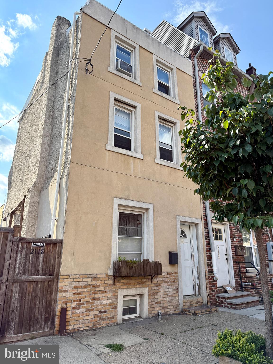 **THIS HOME IS AVAILABLE TO PURCHASE ALONG WITH 2116 (garage) AND 2118 (lot) NORTH 2ND STREET FOR AN UNBELIEVABLE 44X70 TRIPLE LOT**
Three story home with tons of potential in a prime location in Old Kensington. Extra deep first floor with tons of natural light. Decorative mantel and farmhouse door are just a few of the charming details that set this home apart, along with conveniences like main floor laundry and a first floor bathroom. The second floor features a large full bath and a sunny, spacious bedroom. The beautiful third floor primary bedroom features extra high ceilings with exposed beams and custom storage cabinetry. An office completes the third floor. A bit more renovation will bring this house to its full potential. ARV: $700,000++