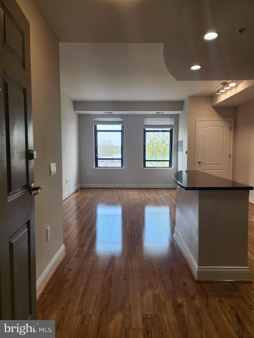 Luxury Condo in the Heart of Old Town! Freshly painted, super sunny home with open kitchen including granite and stainless steel appliances, 42 inch maple cabinets, Hardwood Floors, oversized Closet in Bedroom. Bathroom has double cabinet topped with granite and Kohler fixtures. Washer/Dryer in unit. Secure Garage Parking, and extra storage for bike included. The Henry is located in North Old Town, walking distance to all kinds of great restaurants and shopping, including Trader Joes. 20 minutes to DC. A few blocks to King Street and Braddock Metros. Amenities include a staffed front lobby with concierge service, residents lounge with screening room, fitness center,  party room, billiards room, and great rooftop terrace with stunning views.