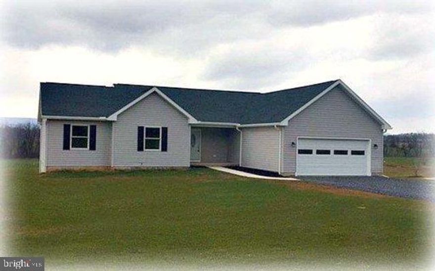 This is a must see to truly appreciate the openness & beauty of the interior of this home. It is all new with stainless appliances, maple cabinets, wide vinyl plank flooring, Cathedral ceilings and plumbing in the basement for an additional bath. Energy efficient LED lighting throughout home, maniblock water system and a cold-cellar in the basement. Enjoy the rear deck to watch the wildlife and enjoy the country setting!