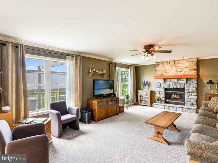 Open foyer-spacious kitchen with island, cabinets galore. Spacious open floor plan consists of family room, dining area and kitchen. Excellent for entertaining in formal dining room(optional first floor in-law bedrm), master suite features whirlpool tub, double vanities in both full baths and walk-in closets in all bedrooms. Bonus room 5th bedroom, office, den or exercise room. Enjoy entertaining on a large maintenance free deck and patio and a 2 car garage. A Community Park for your family fun only a block away.