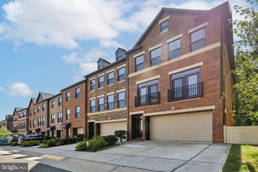 **Stunning contemporary-style spacious 3-bedroom, 3.5-bath end unit townhome with a 2-car garage in the highly sought-after Metro Row!** 

Located at the highest elevation point of the community at the end of the street, this pristinely maintained home backs to a peaceful forest of trees for ultimate privacy. This gorgeous John Jacobs Astor model by NV Homes features numerous upgrades and functional customizations throughout.  It boasts an open-concept main level perfect for entertaining, beautiful hardwood floors, upgraded dining area leading to a cozy sky lanai that overlooks the trees. The sky lanai features a colorful gas-burning fireplace with an added ceiling fan and a large mounted TV.   The chef-inspired gourmet kitchen includes premium custom quartz countertops, an extended island, Energy Star stainless steel appliances, and shaker-style cabinets and drawers.
The upper level features a massive primary bedroom with a luxurious upgraded ensuite bath that includes a large walk-in shower and two his and hers walk-in closets.  Two generous bedrooms, a full bathroom, and an upgraded laundry room with cabinets and custom made folding table complete the upper level. The lower level features a large first-floor bedroom/recreation room, two closets including a custom-built shoe closet, a full bathroom, and direct access to a walkout-level backyard with custom-designed TREX deck with built-in planters.  Lower level also leads directly to a completely finished 2-car garage with epoxy flooring and another custom-built large storage space / tool shed.  Enjoy a newly created spacious mudroom complete with marble flooring that is unique ONLY to this unit.   The backyard backs into Fairfax County protected forest.  Minutes to Vienna Metro and bus stop, just minutes to Rt 66, and within the Oakton High School pyramid, with nearby dining and shopping.     Fantastic central location.  This is a MUST see and won't last!
Photo will be uploaded on 9/10

FEATURES of home include:

SECURITY: 
-Motion and door sensors for alarm system and monitoring

EXTERIOR:
-Custom built extended concrete driveway
-Side privacy fence to cover the trash containers and custom built concrete slab for dual trash containers

DECK:
-Custom built deck with highest quality TREX with custom designed outdoor built in large planters
-Deck water hose hangers
-Security Arlo cameras installed along entire perimeter of home

GARAGE:
-Epoxy finished garage floor
-Finished painted garage
-Custom built additional spacious large storage with door and tool shed in the garage
-Additional water hook and hose
-Garage window with privacy blinds
-Additional built in outlets 

INTERIOR:

KITCHEN:
-Chefs Kitchen with custom built-in Culligan drinking water filter system on the island for easy access
-Upgraded lights over island
-Upgraded back splash

MUDROOM:
Custom built large spacious open mudroom with marble floors (The ONLY unit that has this option)

1st FLOOR
-Walkout level to backyard deck
-French doors to deck, Andersen screen door and newly painted to match the deck
-Custom built shoe closet with high end shelves
-High quality low profile carpet resistant to moisture or dirt and easy to clean
-Bathroom with large shower head extension
-High quality low profile dust and moisture resistant, anti-slip stairway carpet runners throughout all stairs
-Marble floor entry

LIVING ROOM:
-High quality real hard wood flooring throughout
-Upgraded feature on the dining room wall

SKY LANAI:
-Mounted TV custom installed
-Ceiling fan
-Mesh screen cover
-Door screen door
-Gas fireplace with changing background colors

LAUNDRY ROOM:
-Custom built folding table
-Custom built overhead cabinets for storage
-Marble floor

ADDITIONAL FEATURES:
-Primary bathroom upgraded tiles
-Closets with additional electrical outlets
-Custom window treatment blinds for all windows and French doors